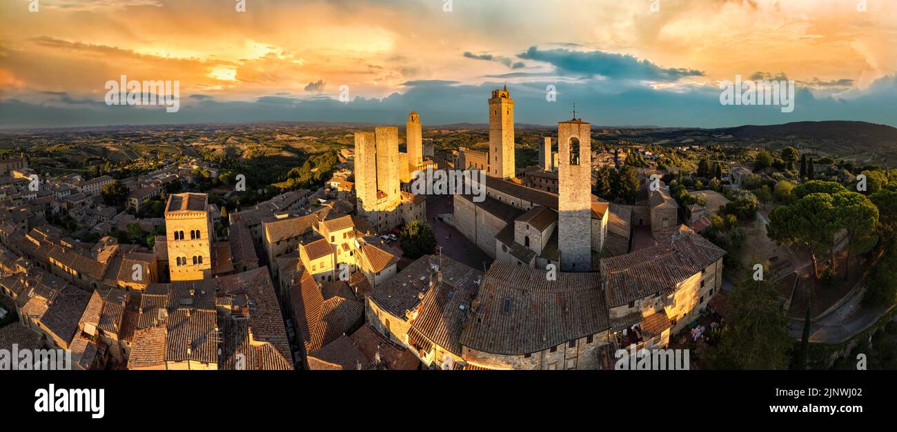 San Gimignano - one of the most beautiful medieval towns in Tuscany, Italy.  aerial view of towers over sunset. Stock Photo