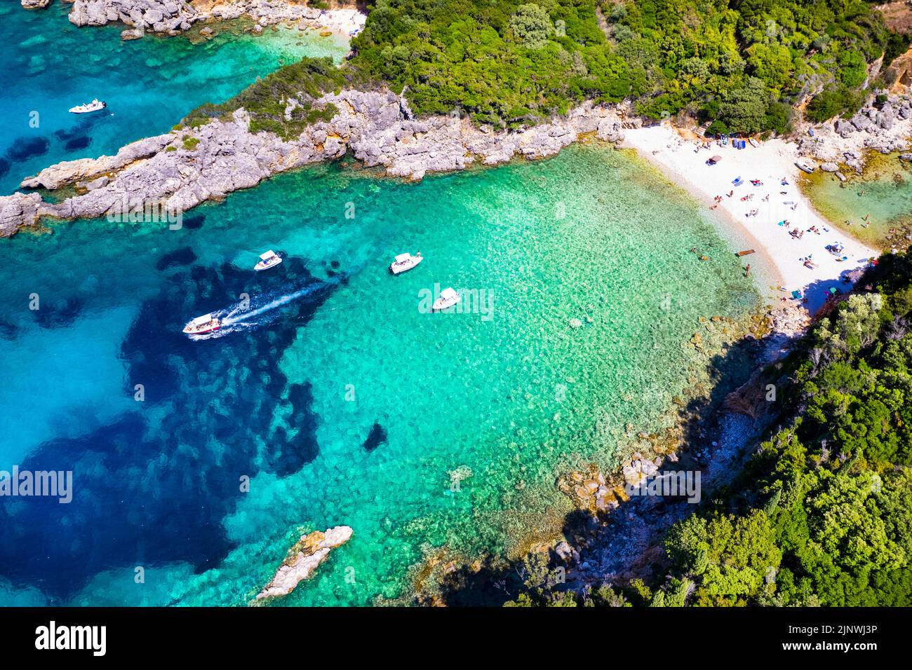 Corfu island, Greece . Aerial view of beautiful double beach with turquoise clear waters Limni beach Glyko near Paleokastritsa Stock Photo