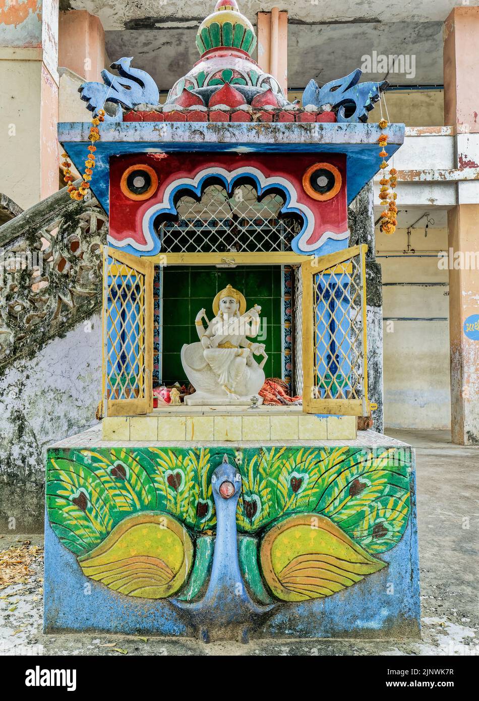 03 Nov 2019 Vintage Marble statue of Devi Saraswati Goddess of Knowledge inside compound of school Bhiloda Aravalli District Gujarat India Stock Photo