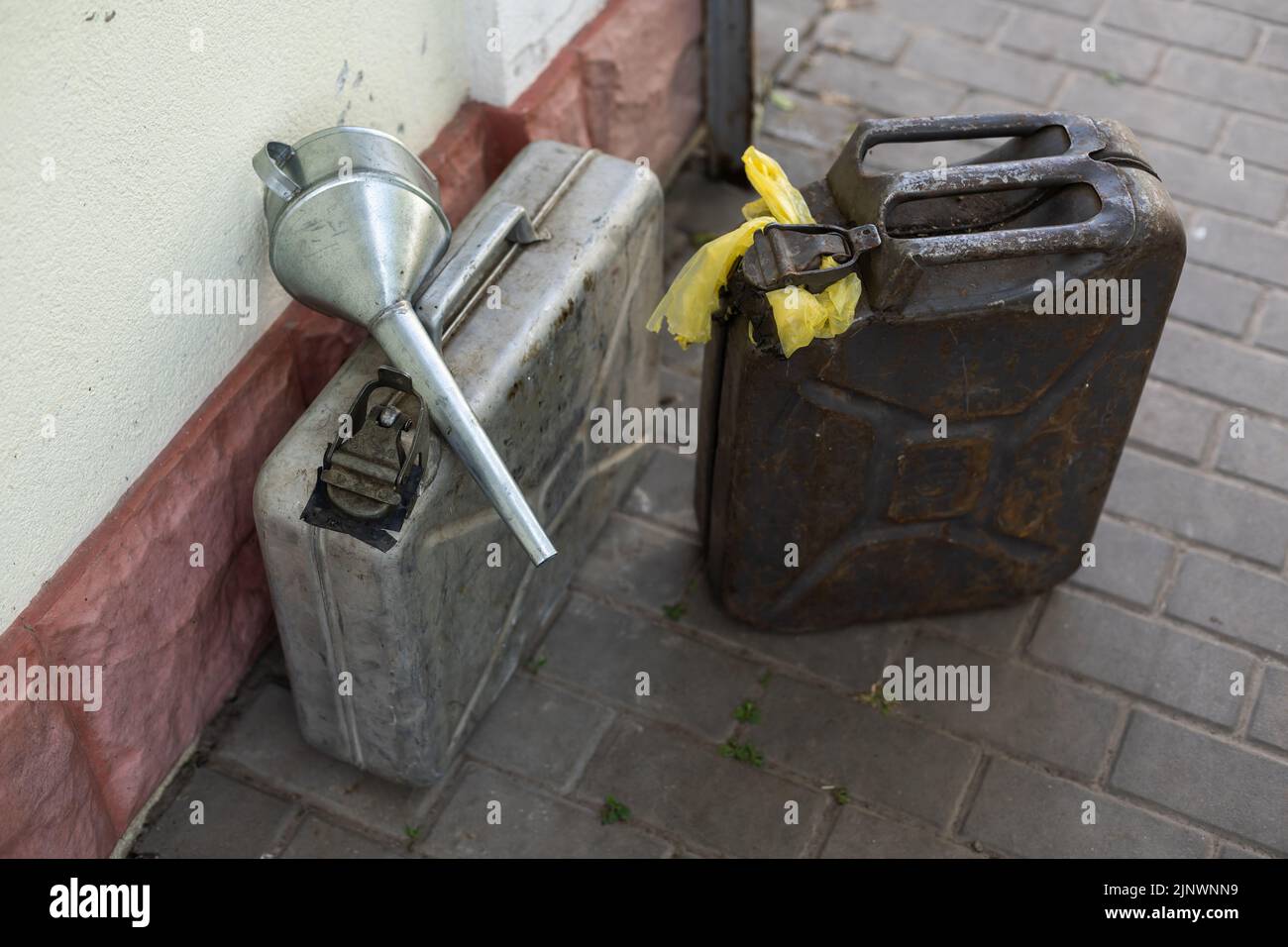 canister and watering can for diesel. the canister with the fuel and