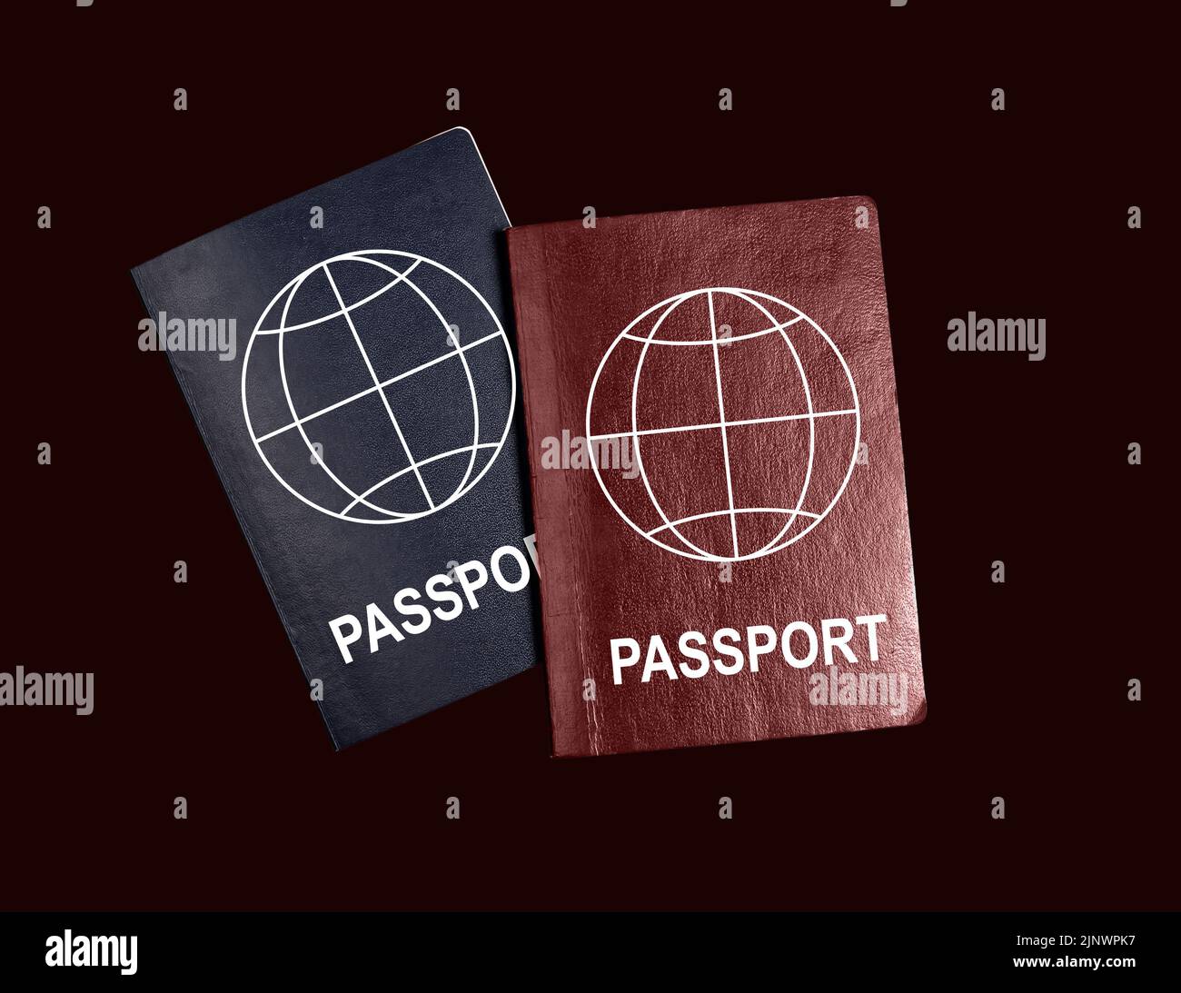 Two different passports top view. Abstract citizenship nationality documents of blue and red color. Stock Photo