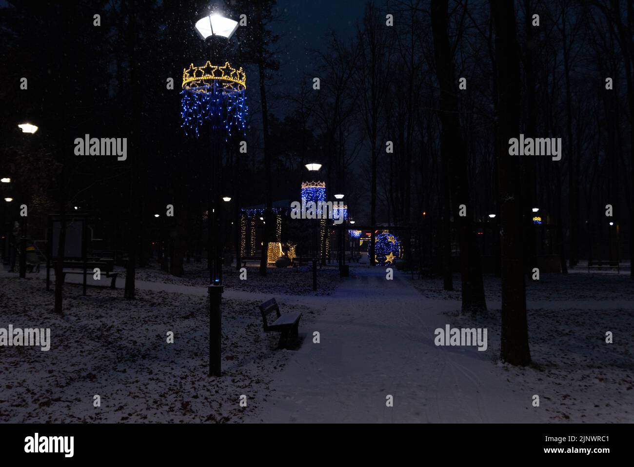 The night before Christmas in the city park. Lantern with Christmas