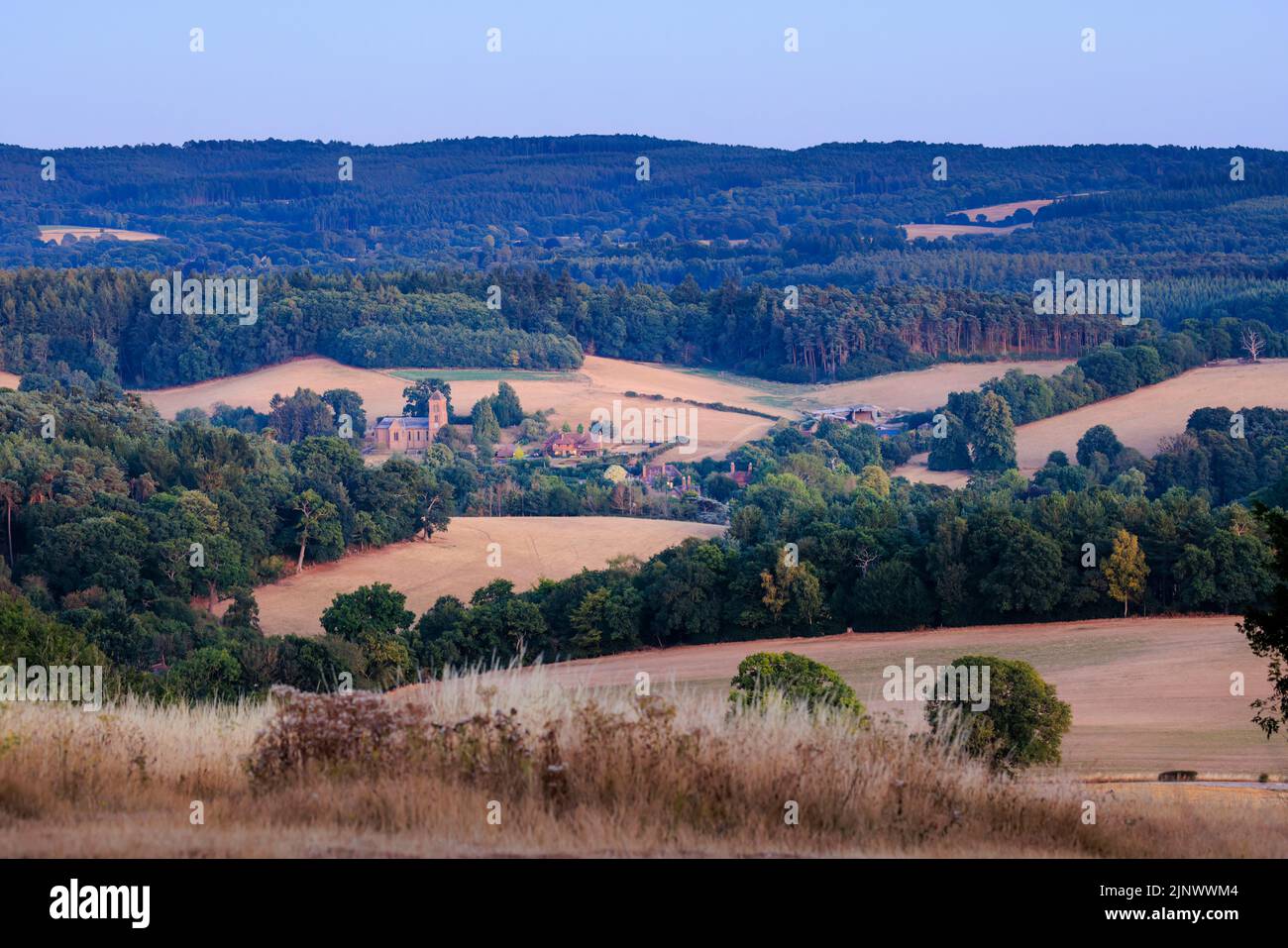 Panoramic view of countryside, church and farm buildings from Newlands