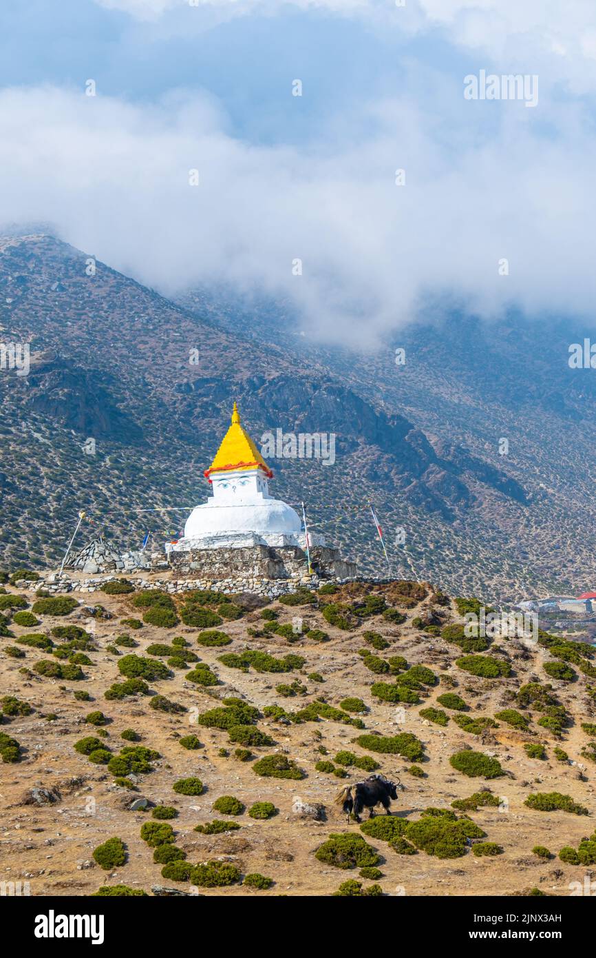 Stupa near Dingboche village with prayer flags and mounts Kangtega and
