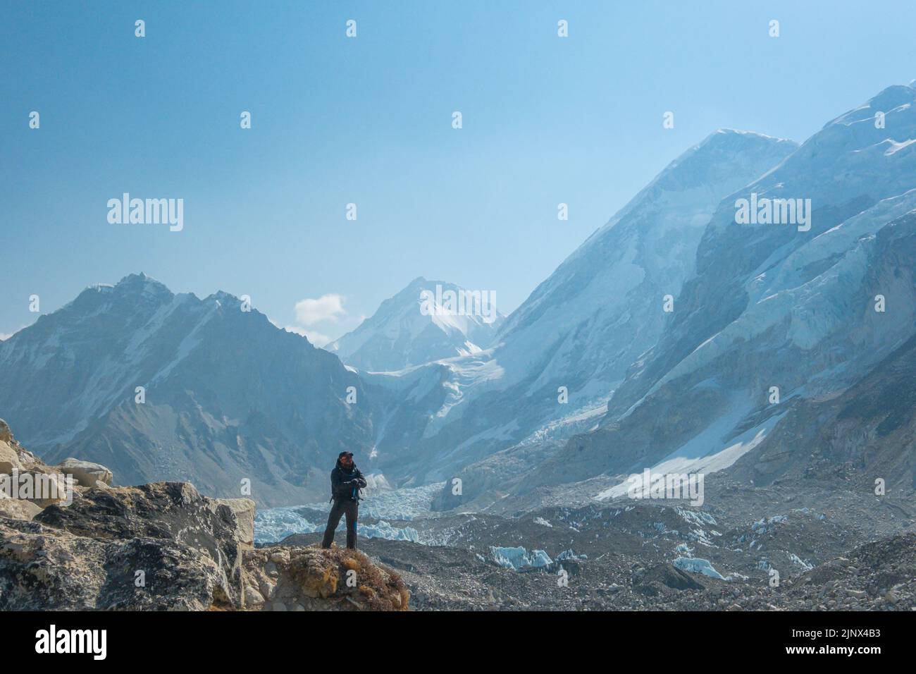 Male backpacker enjoying the view on mountain walk in Himalayas ...