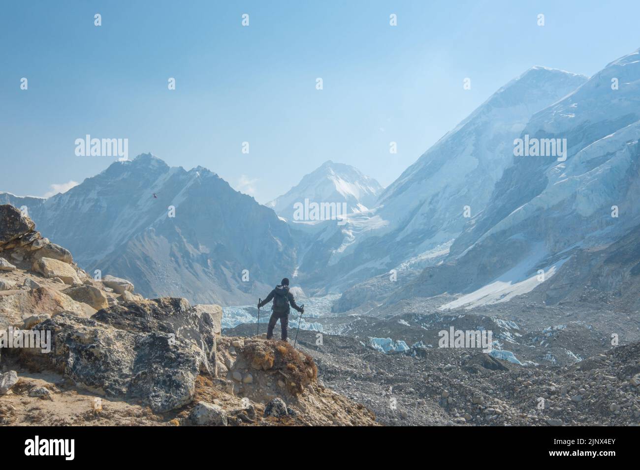 Male backpacker enjoying the view on mountain walk in Himalayas ...