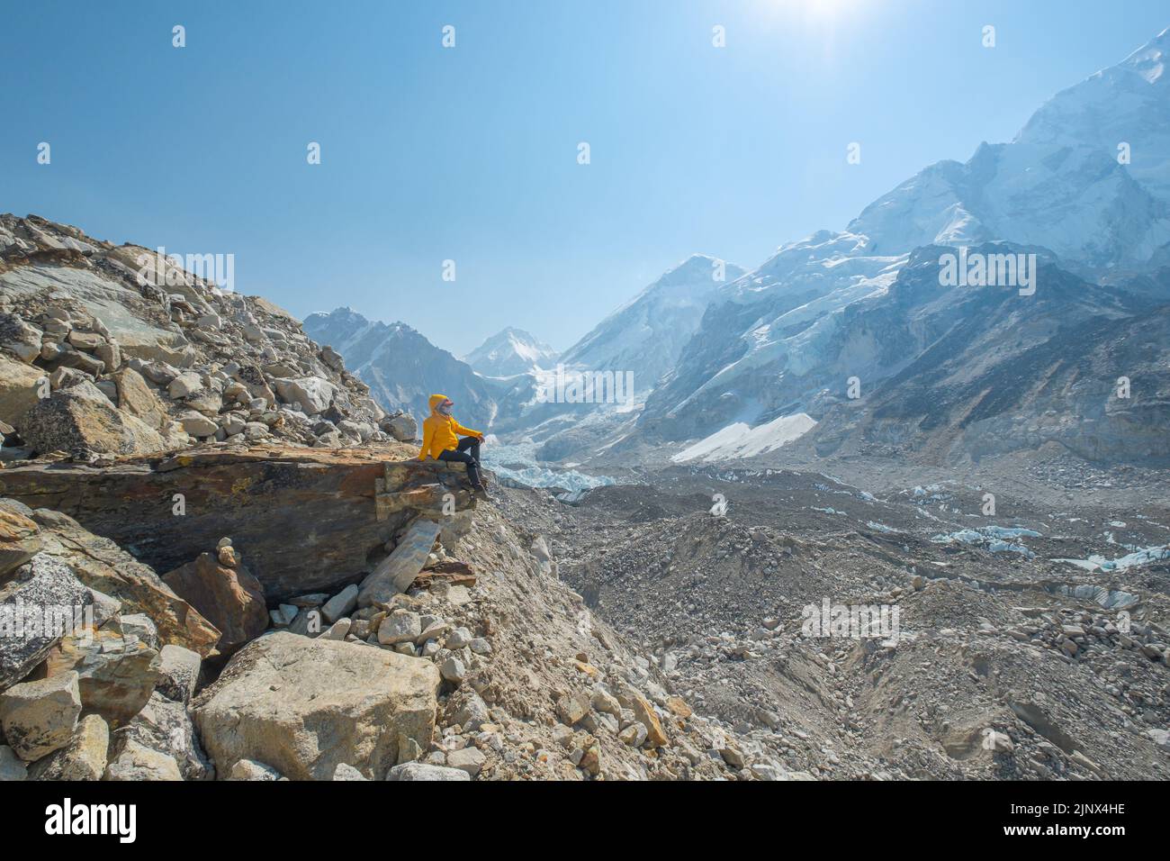 Female backpacker enjoying the view on mountain walk in Himalayas ...