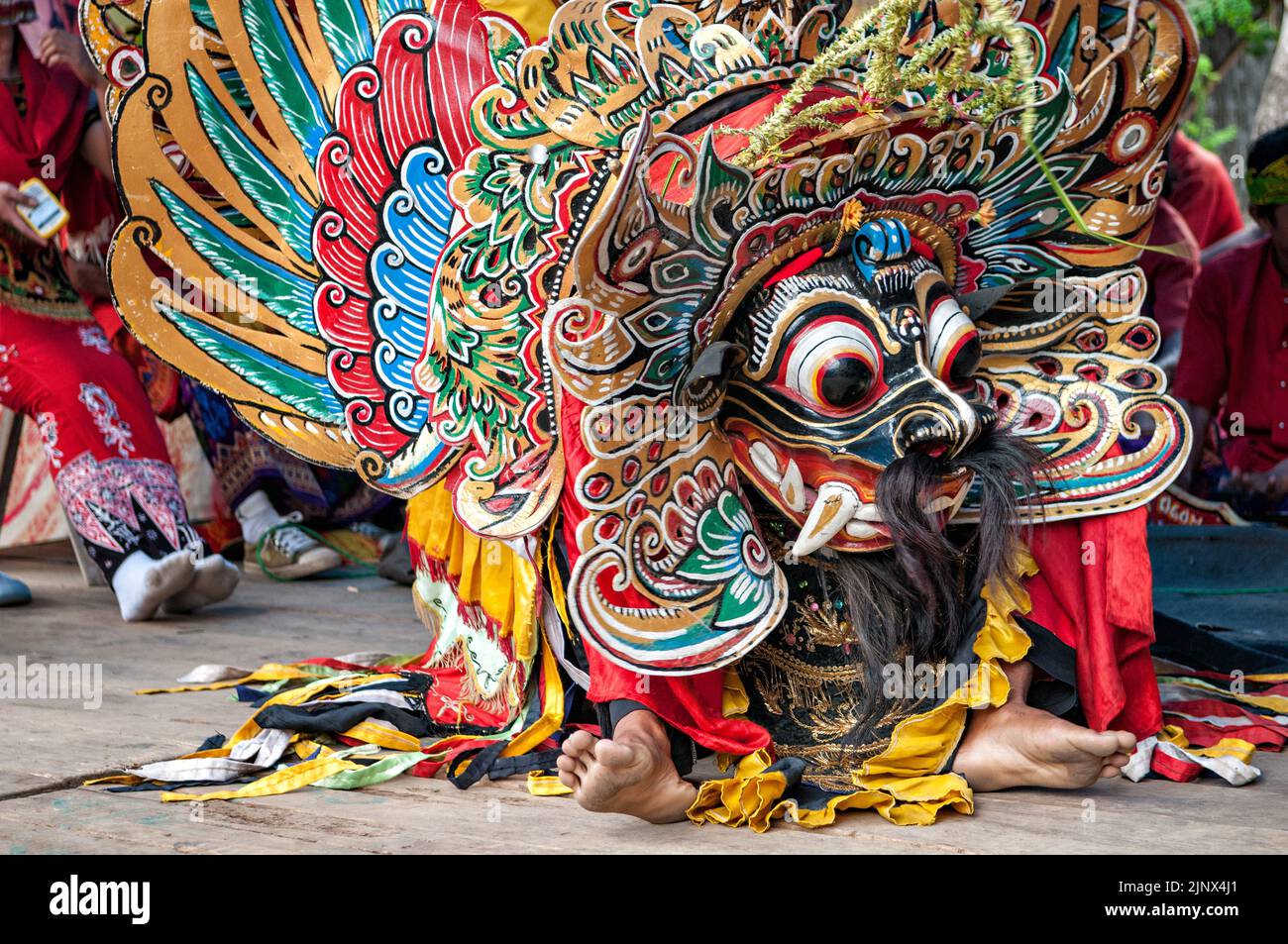 Large mask during a Barong dance in a village, East Java province, Indonesia Stock Photo