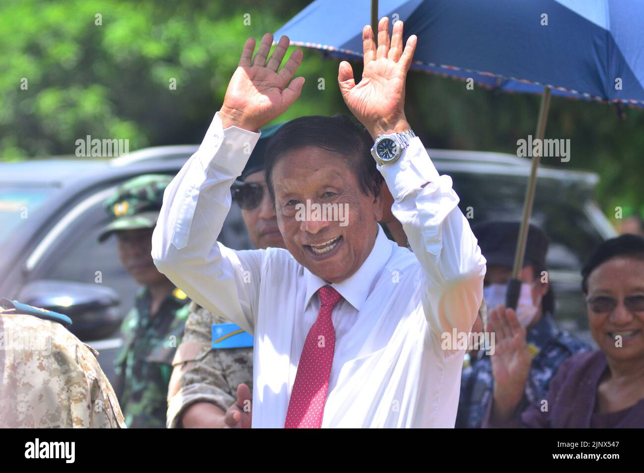 Dimapur, India. 14th August, 2022: TH Muivah, General Secretary of National Socialist Council of Nagalim-Isak Muivah (NSCN-IM) wave to people as he leaves after attending the 76th Naga Independence Day celebration at Camp Hebron, some 35kms away from Dimapur, India north eastern state of Nagaland. NSCN-IM is one of the longest political insurgency on South East Asia with political negotiation with Indian Government. Credit: Caisii Mao/Alamy Live News Stock Photo