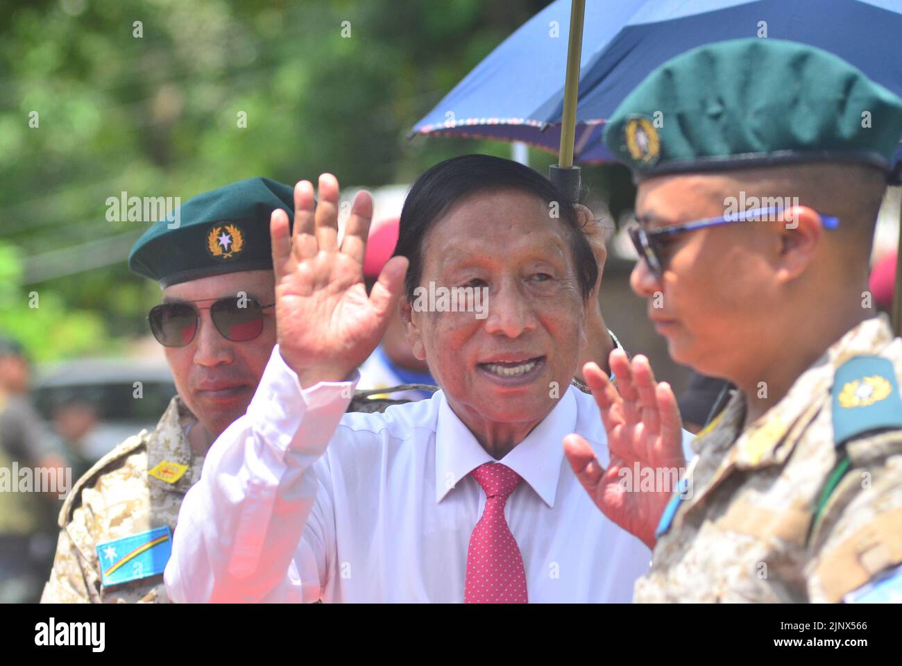 Dimapur, India. 14th August, 2022: TH Muivah, General Secretary of National Socialist Council of Nagalim-Isak Muivah (NSCN-IM) wave to people as he leaves after attending the 76th Naga Independence Day celebration at Camp Hebron, some 35kms away from Dimapur, India north eastern state of Nagaland. NSCN-IM is one of the longest political insurgency on South East Asia with political negotiation with Indian Government. Credit: Caisii Mao/Alamy Live News Stock Photo