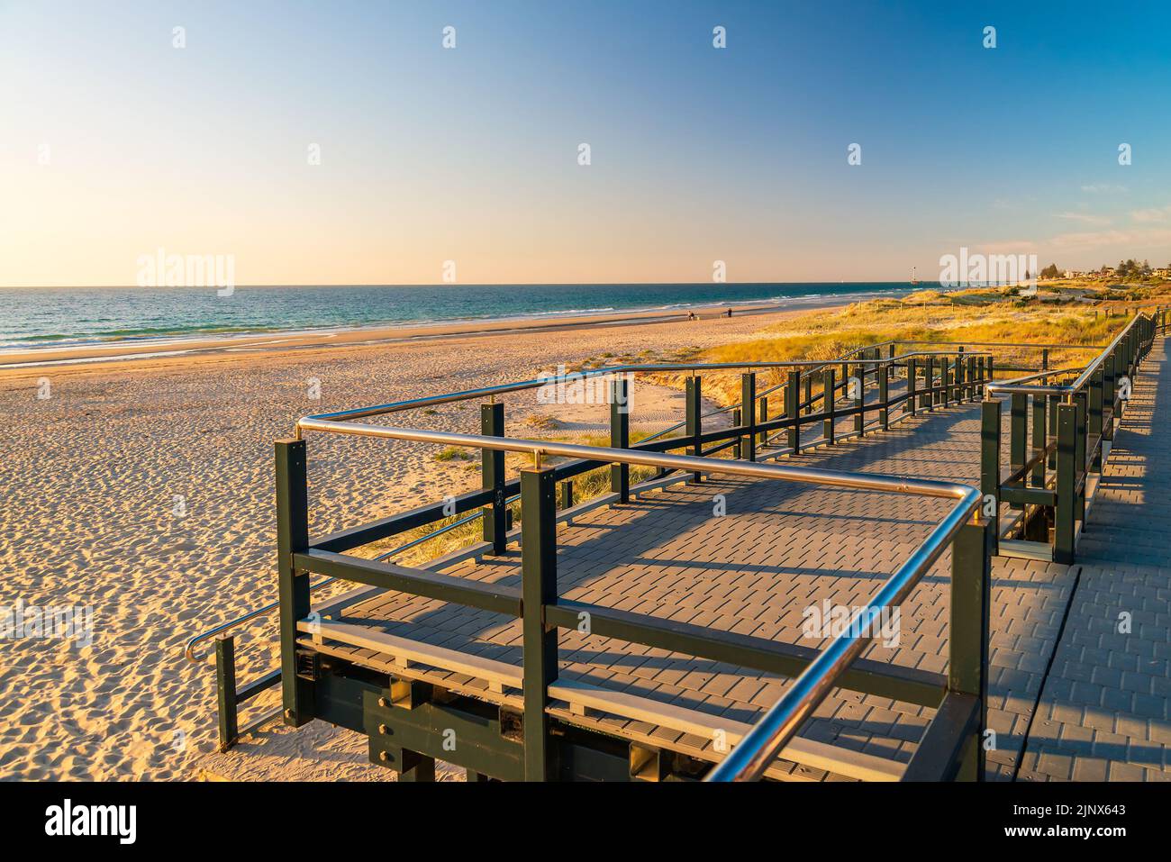 Seacliff beach new esplanade looking towards Brighton at sunset, South Australia Stock Photo