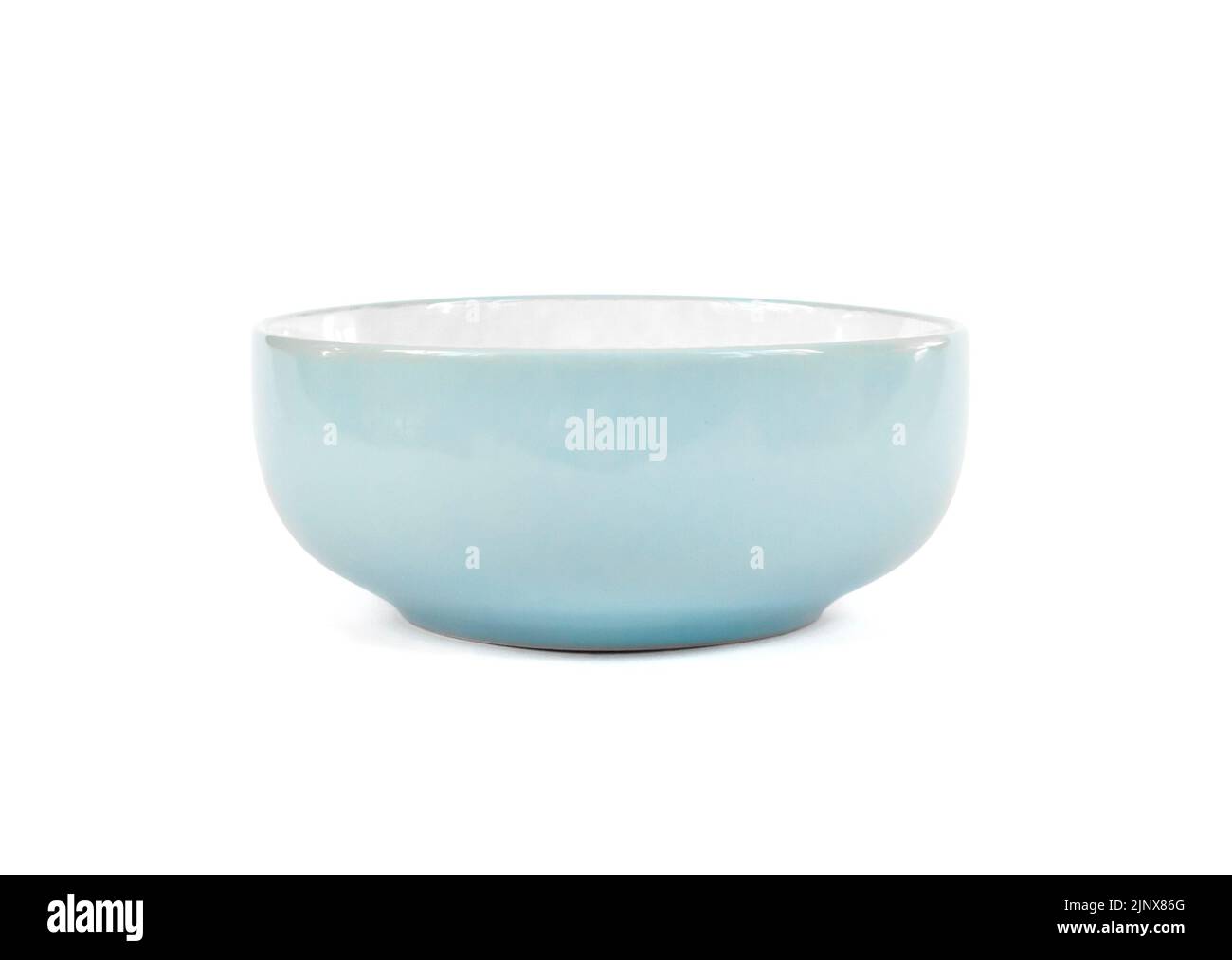 Blue ceramic bowl isolated on white background with clipping path Stock Photo