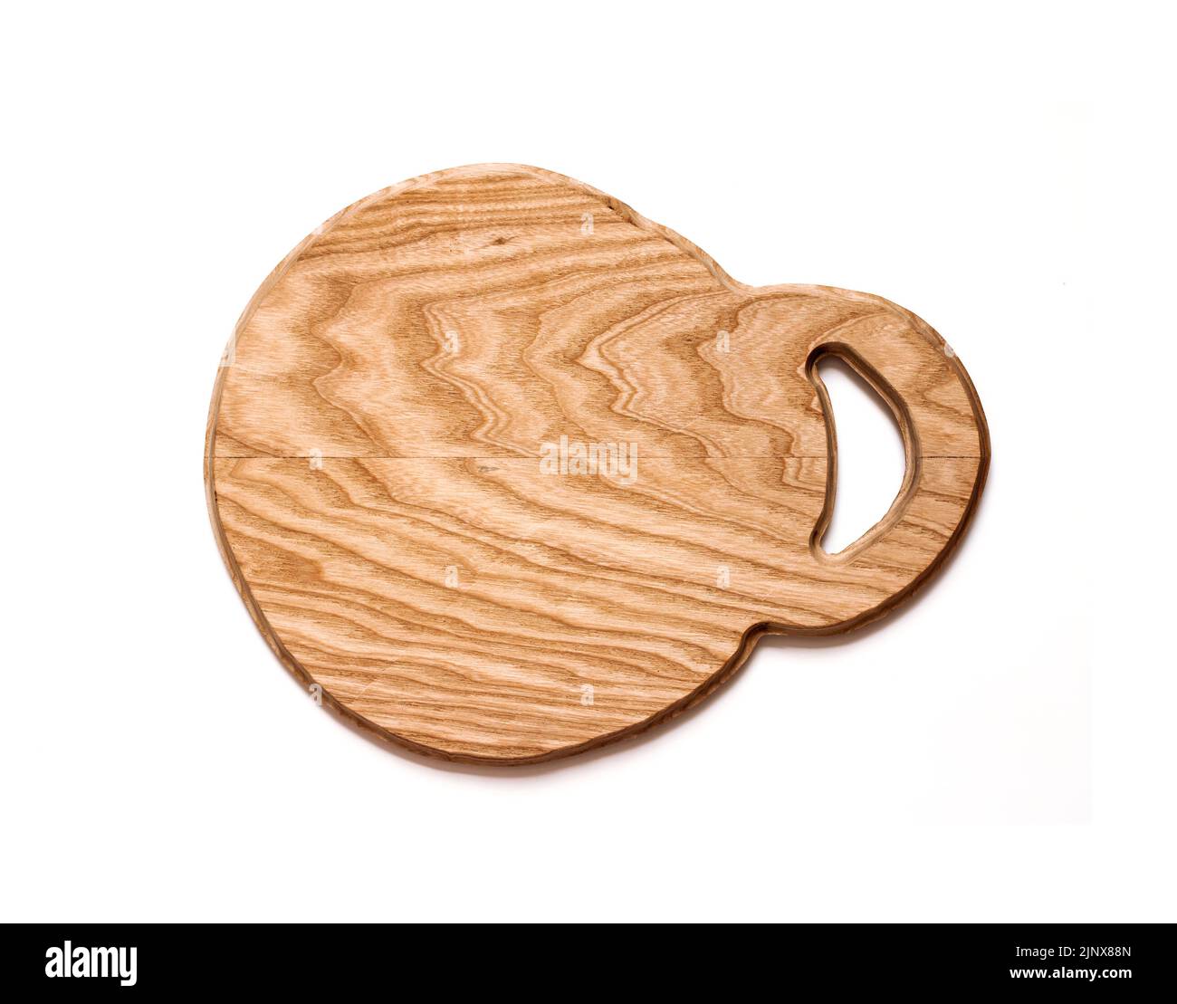 Handmade wooden cutting board isolated on white background Stock Photo