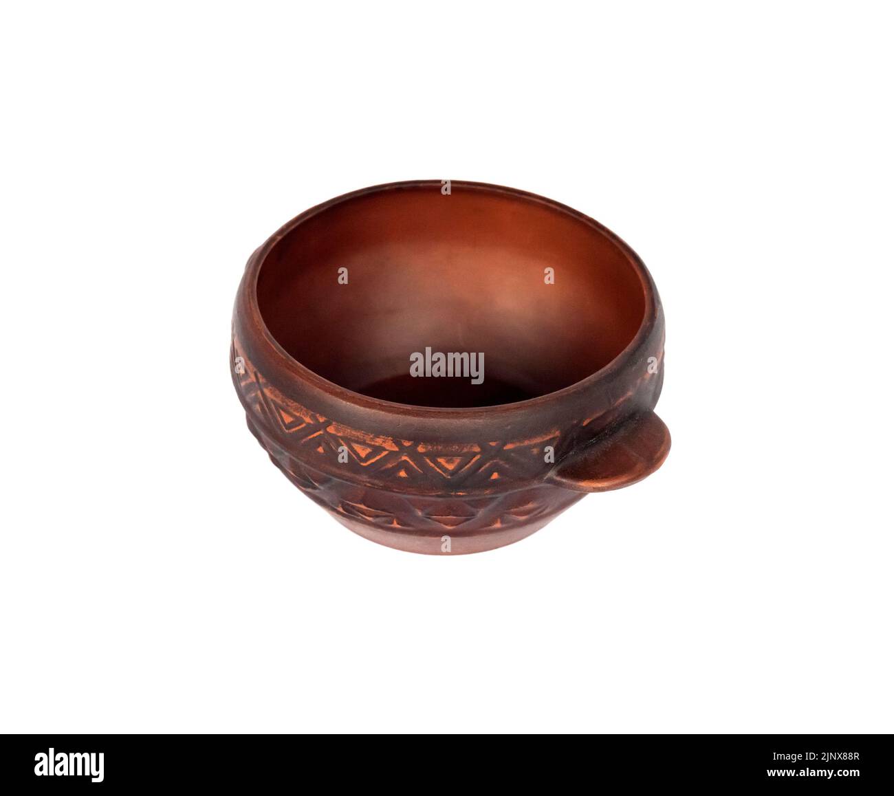 Brown ceramic rustic bowl isolated on white background Stock Photo