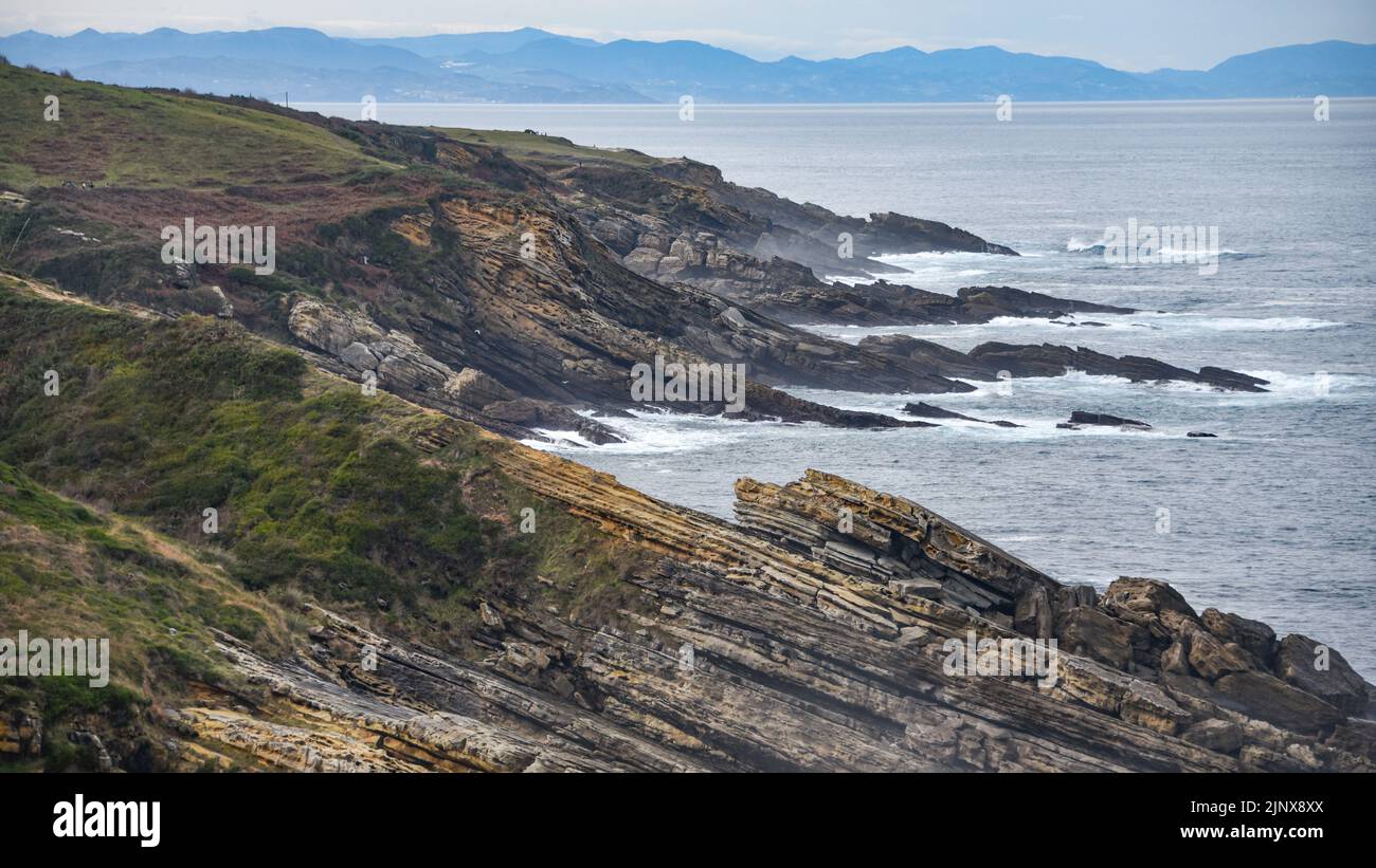 San Sebastian, Gipuzkoa, Spain - 26 Dec 2021: Winter landscapes along the Basque coast from Jaizkibel Stock Photo