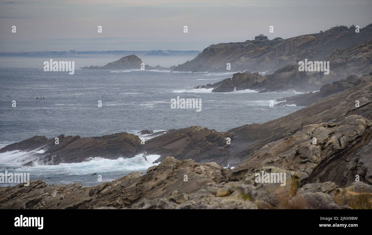 San Sebastian, Gipuzkoa, Spain - 26 Dec 2021: Winter landscapes along the Basque coast from Jaizkibel Stock Photo