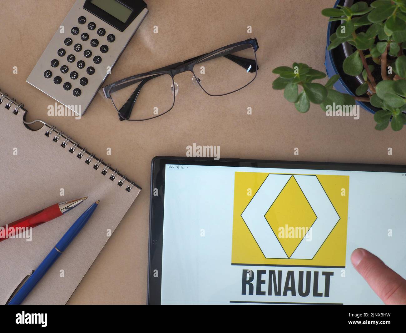 In this photo illustration, Renault Group logo seen displayed on a tablet Stock Photo