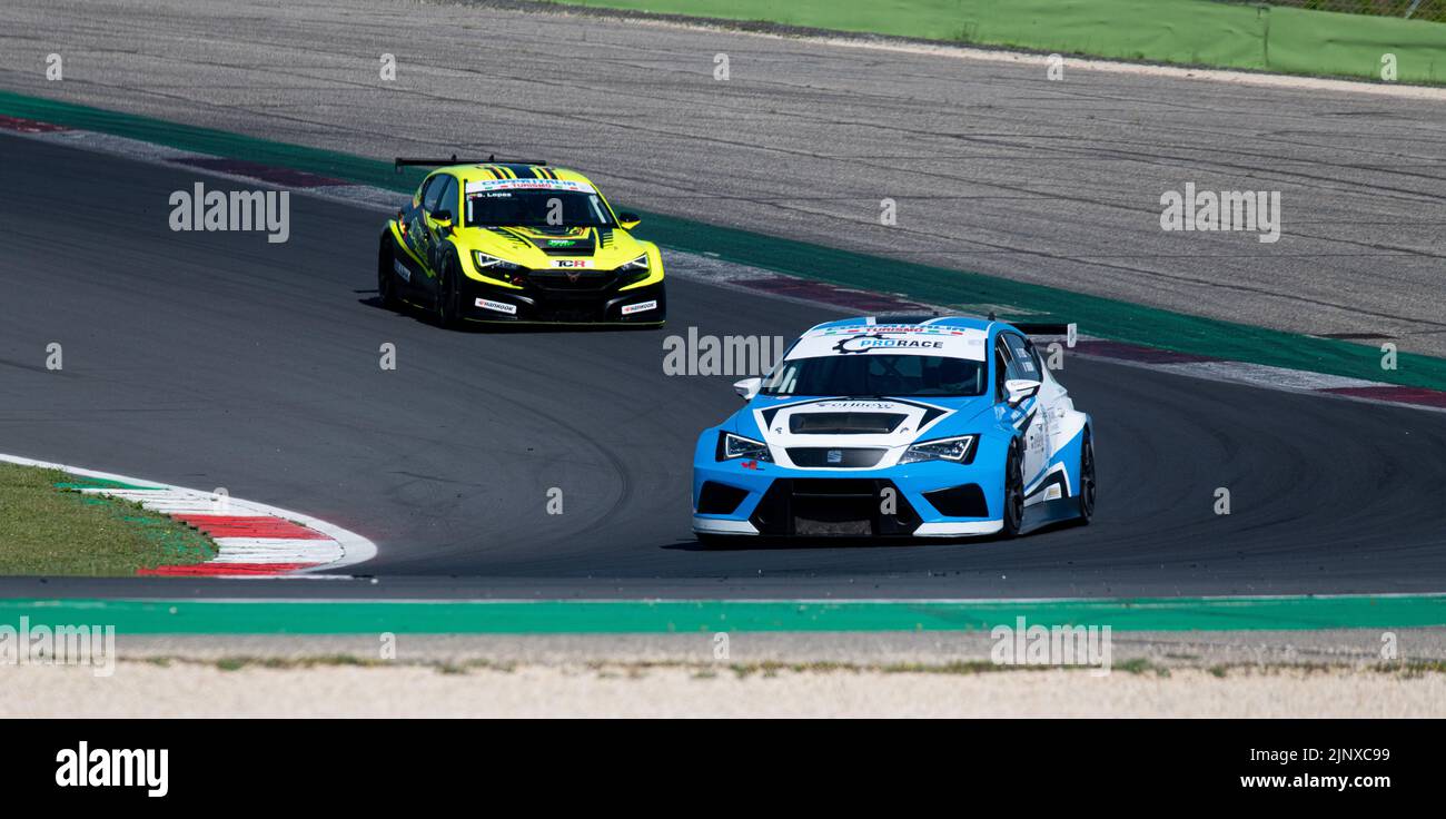 Racing car Seat Leon challenging at turn on racetrack motor sport action. Vallelunga, Italy. April 30 2022, Racing weekend Stock Photo