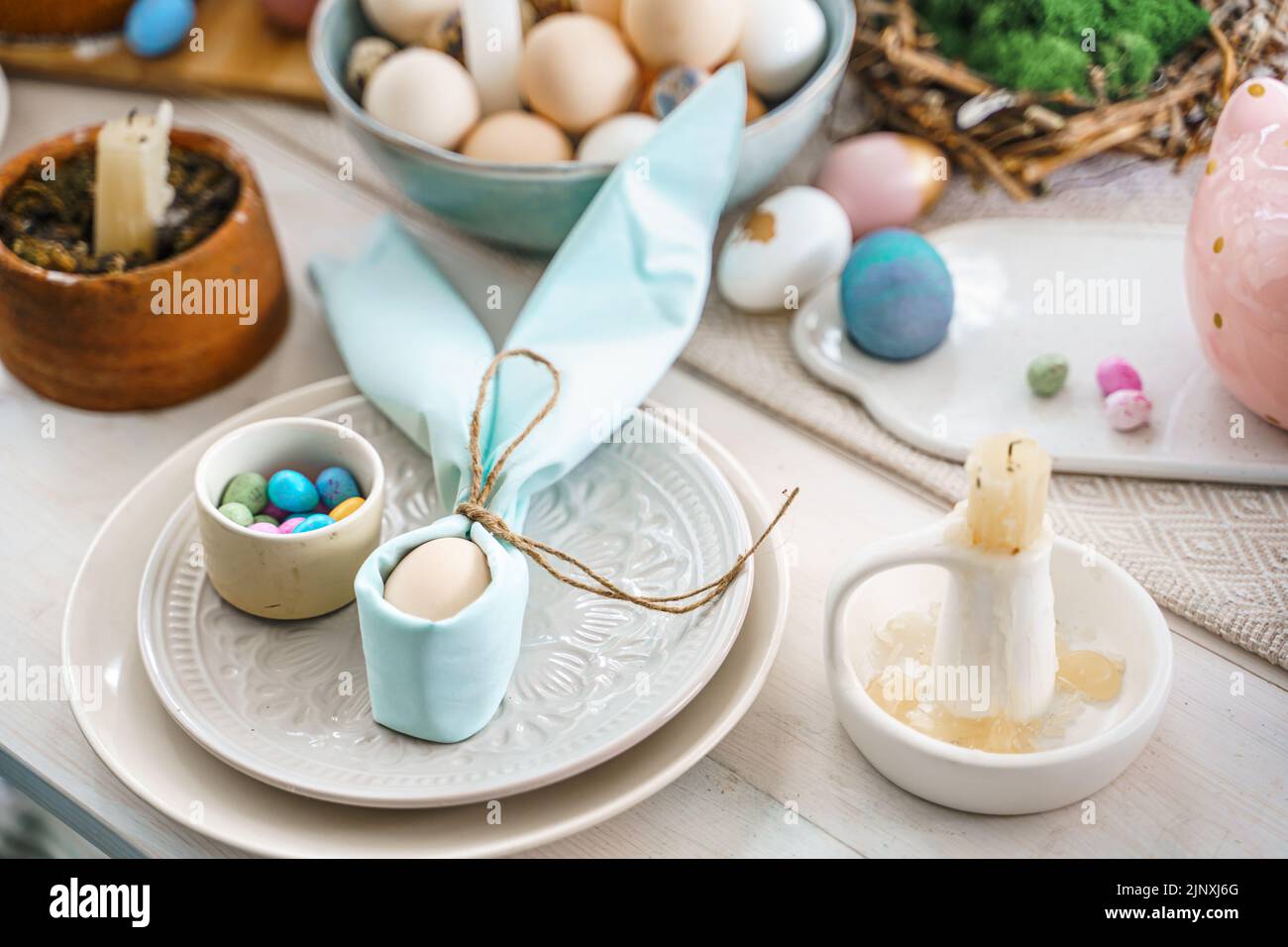 Table decoration for Easter celebration in kitchen.Tablescape for Easter holiday at home.Family religious traditional festive christianity,catholic me Stock Photo