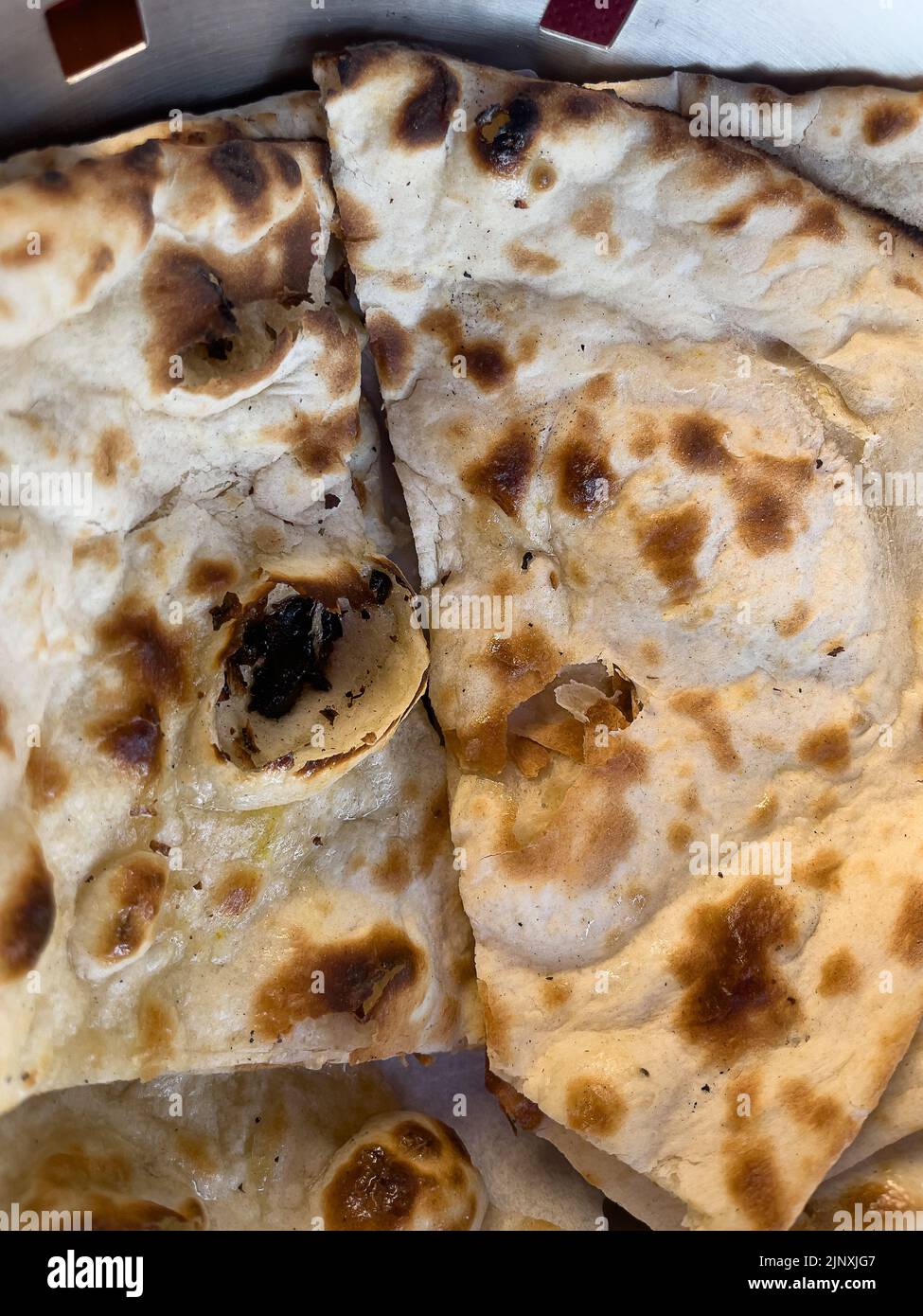 Naan (Hindi नान, Persian نان, romanized nān, Urdu نان, Pashto نان