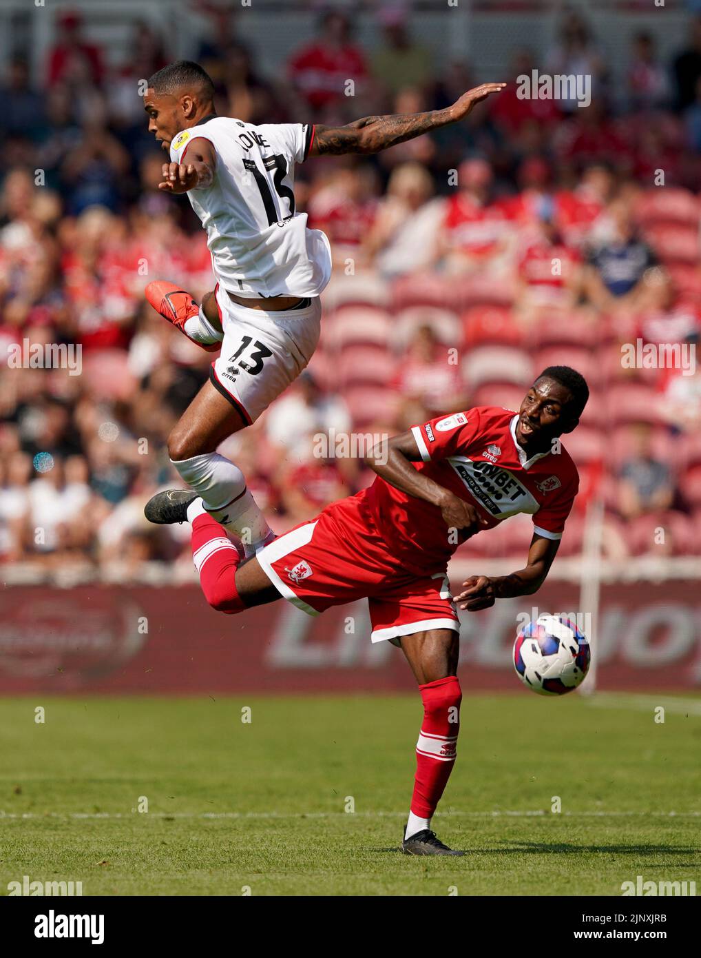 Sheffield United's Max Lowe battles with Middlesbrough's Isaiah Jones during the Sky Bet Championship match at the Riverside Stadium, Middlesbrough. Picture date: Sunday August 14, 2022. Stock Photo