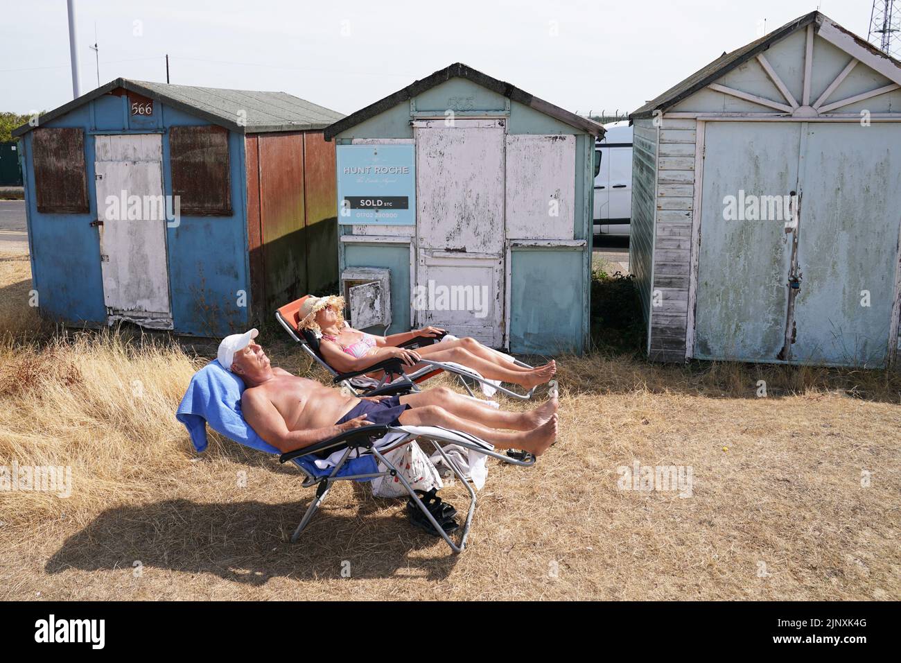 People enjoy the hot weather at Southend-on-Sea. A drought has been declared for parts of England following the driest summer for 50 years. Picture date: Sunday August 14, 2022. Stock Photo