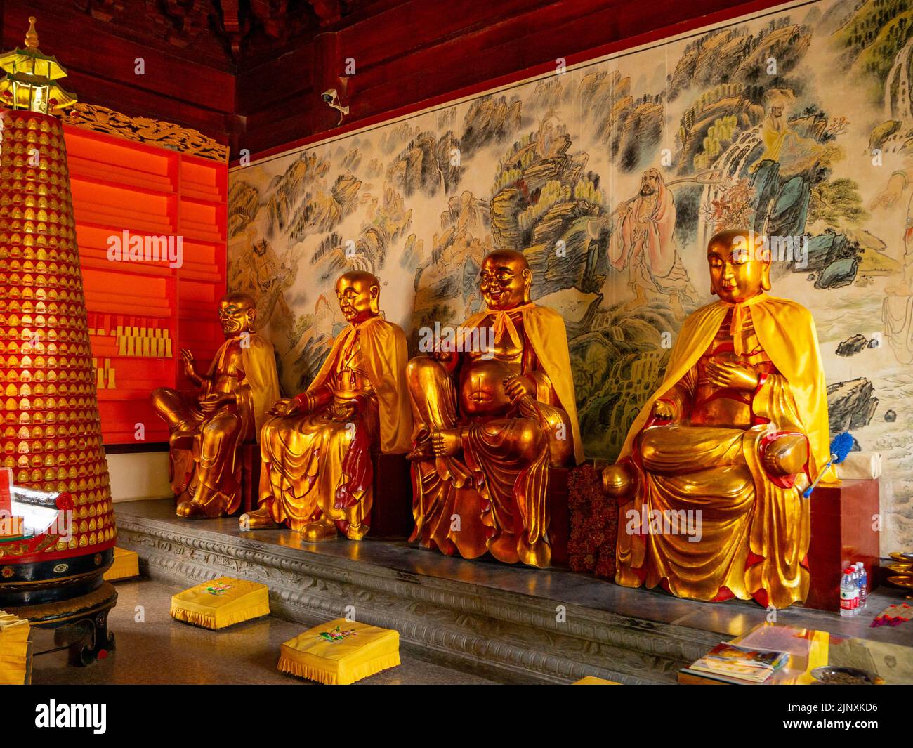 A group of golden Chinese traditional religious statues or sculptures