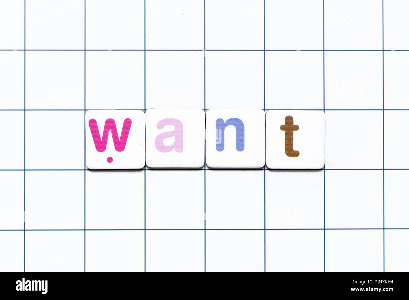 Colorful tile letter in word want on white grid background Stock Photo ...
