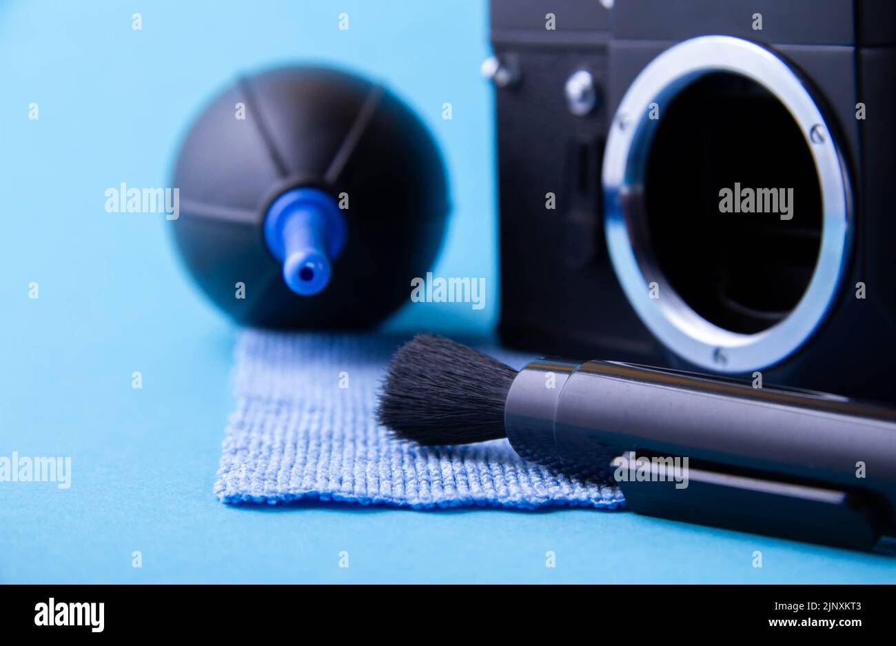 Cleaning of photographic equipment. Camera repair. Removing dust from the lens. Matrix cleaning