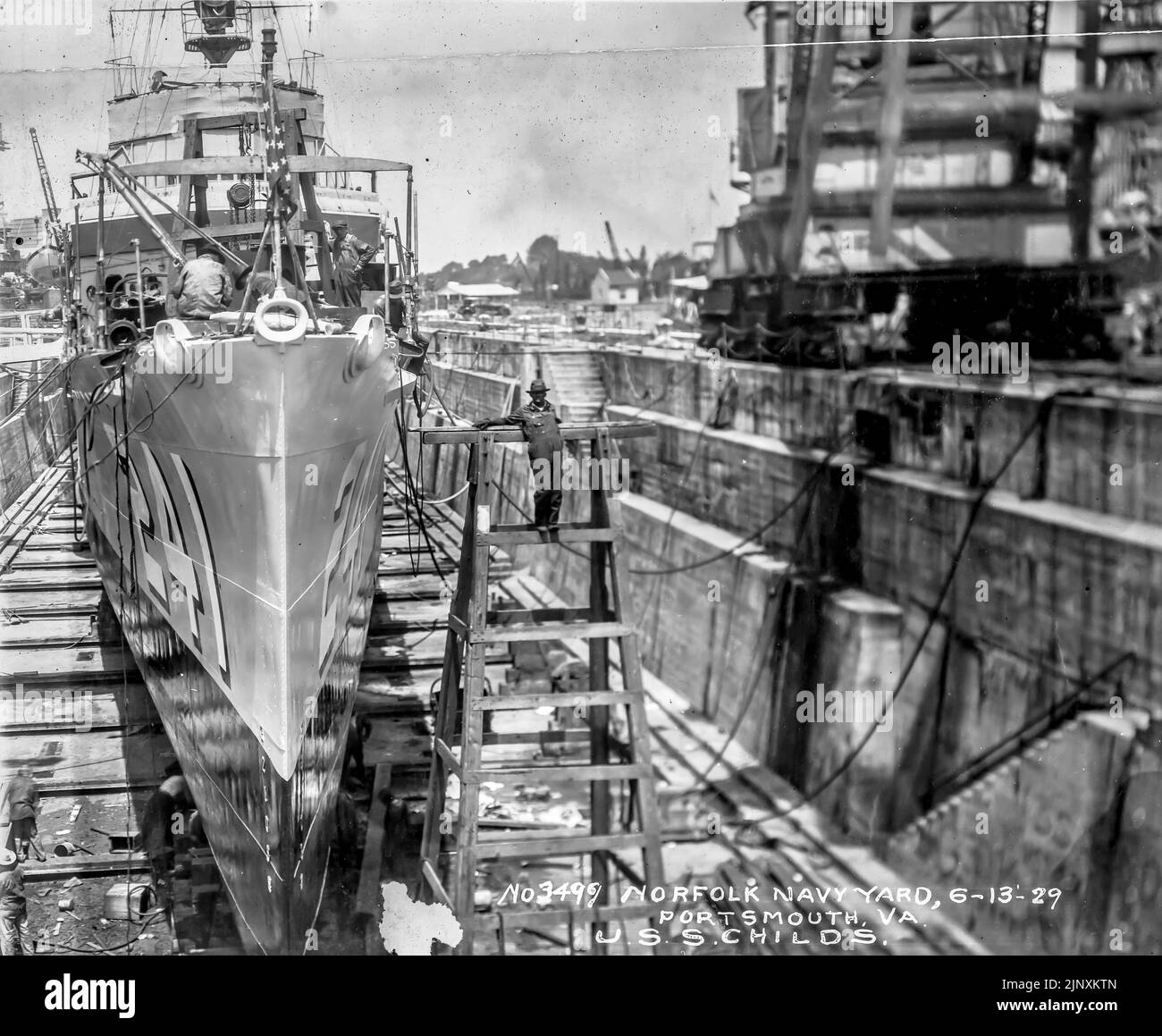 Bow first view of USS CHILDS ( DD-241 / AVP-14 / AVD-1 ) in dry dock June  13 1929 for repairs and replacement of the bow following the collision with a schooner on April 4 1929  http://www.navsource.org/archives/05/241.htm https://catalog.archives.gov/id/52560599 Stock Photo