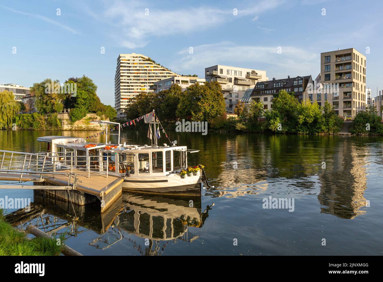 Waterfront in Ulm with residential buildings in the background Stock Photo
