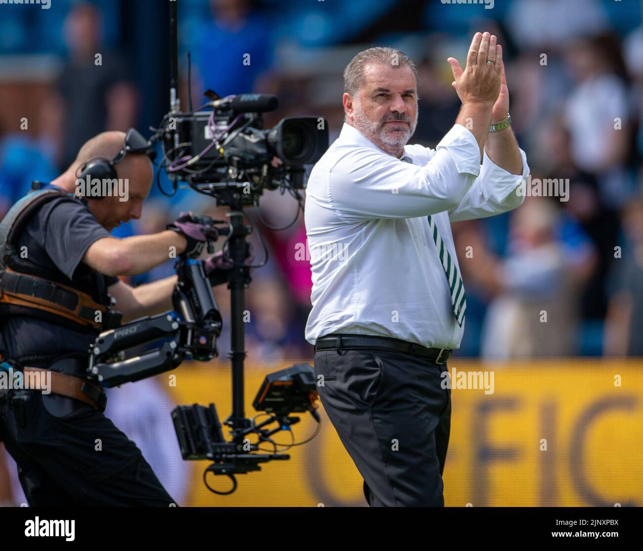 Kilmarnock, Scotland, UK. 14th August 2022; The BBSP Stadium Rugby Park, Kilmarnock, Scotland: Scottish premier league football, Kilmarnock FC versus Celtic: Celtic Manager Angelos Postecoglou applauds the travelling supporters Credit: Action Plus Sports Images/Alamy Live News Stock Photo