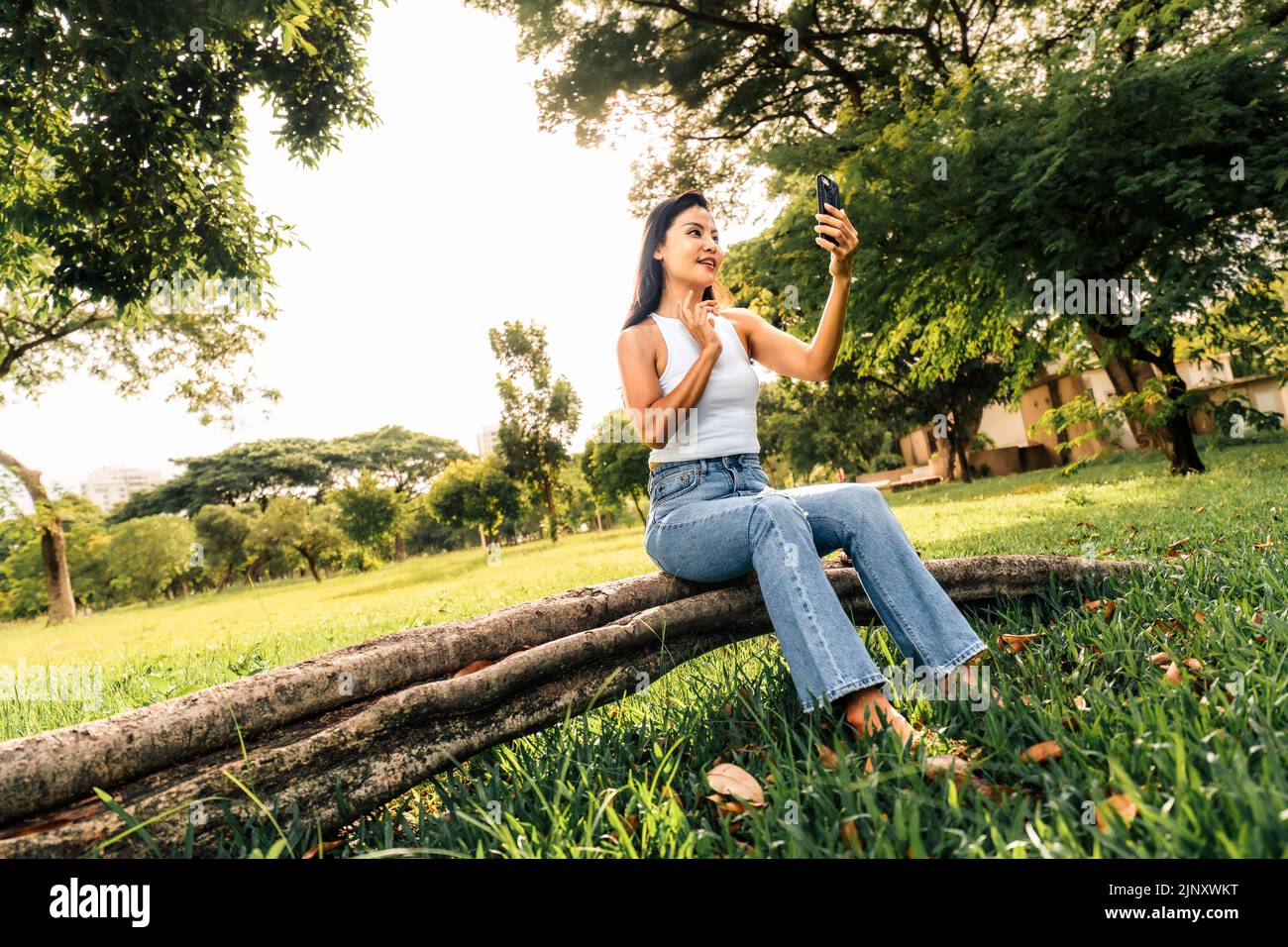 Happy pretty asian woman using hi-res stock photography and images - Alamy