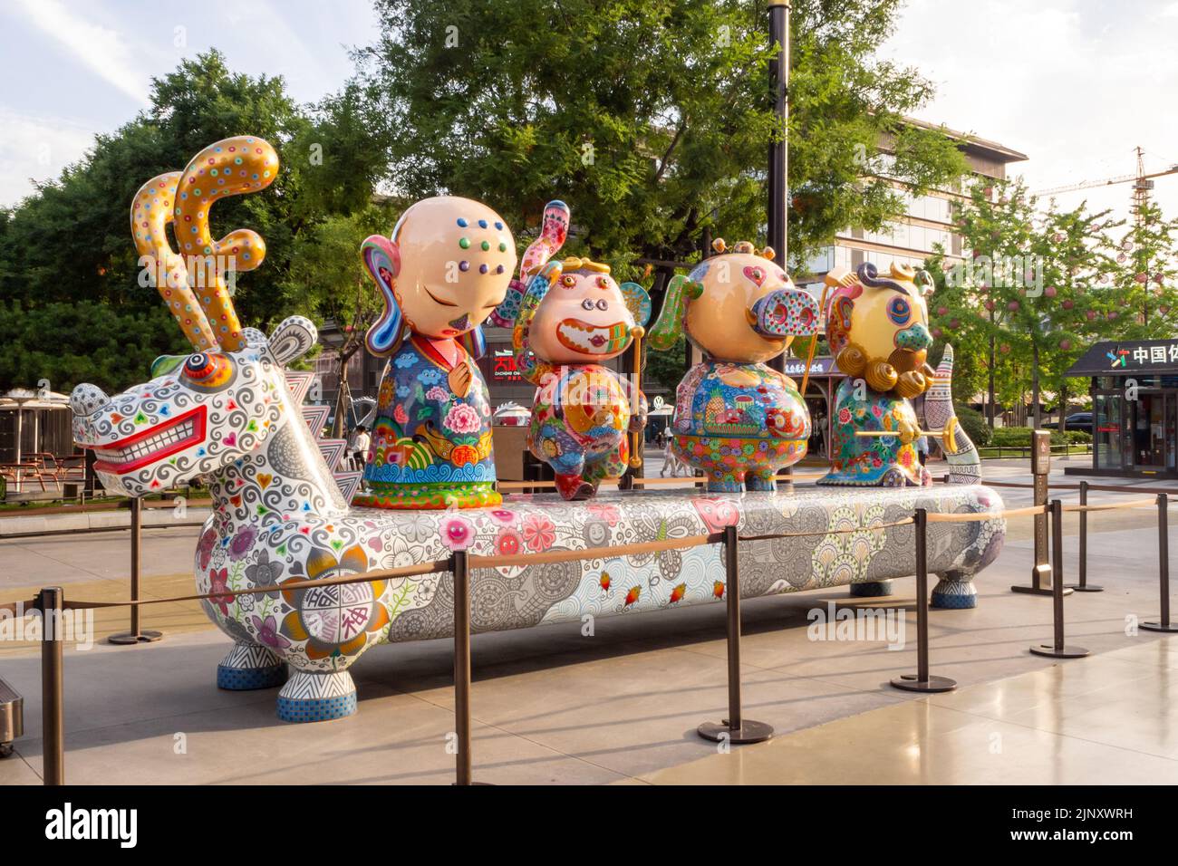 Xian, China, 2022,Traditional Chinese sculpture with a Christmas theme in a public plaza or town square. Stock Photo