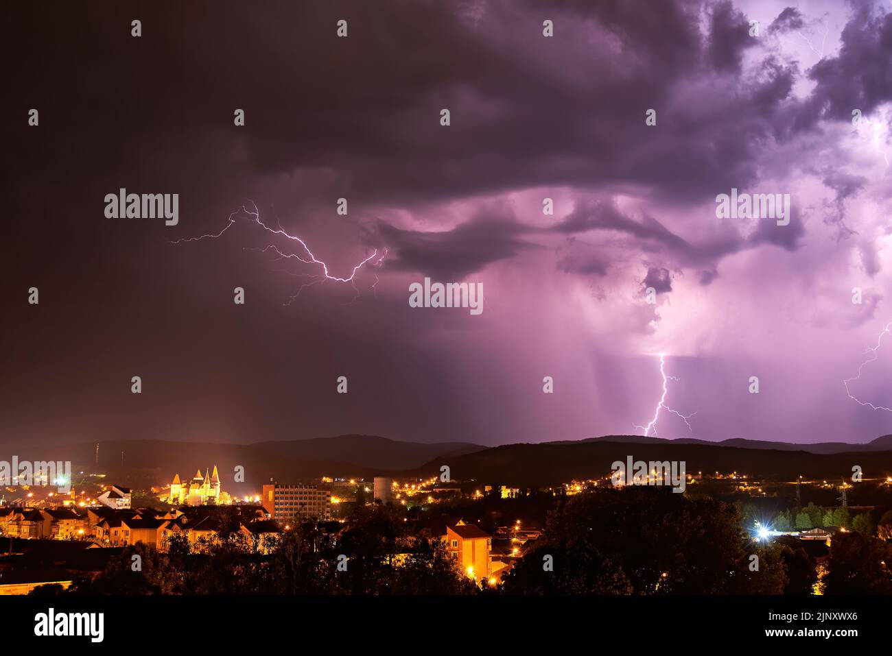 Storm Clouds and Lightning Bolts above the City Stock Photo - Alamy