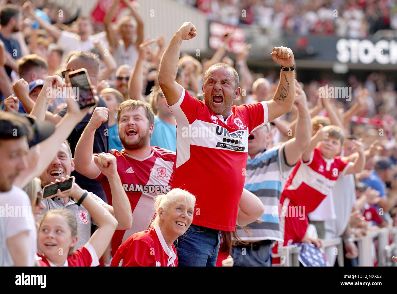 Middlesbrough fans celebrates during the Sky Bet Championship match at the Riverside Stadium, Middlesbrough. Picture date: Sunday August 14, 2022. Stock Photo
