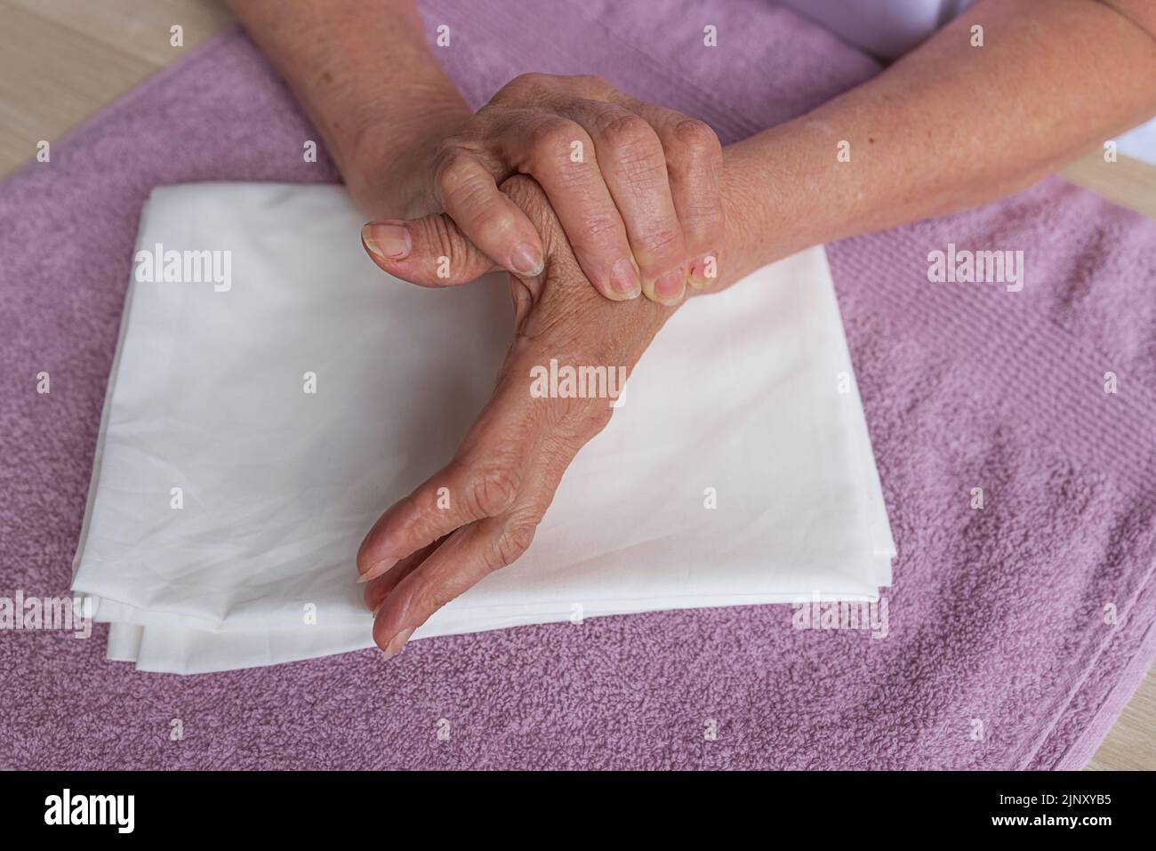 step by step instructions step 3. Close-up of a woman's hand massaging ...