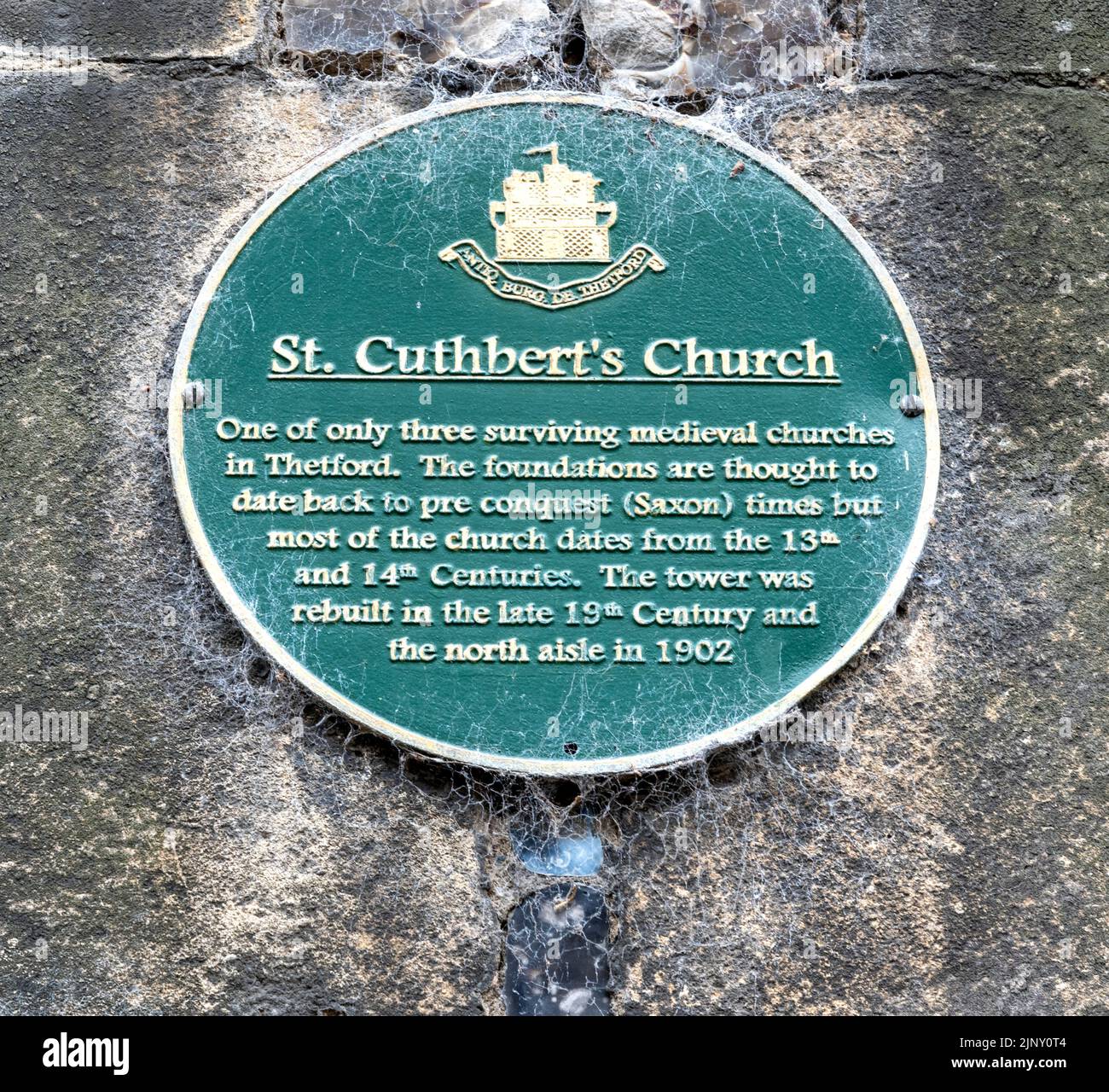 Green heritage plaque at St Cuthbert's Church, King Street, Thetford, Norfolk, England, UK Stock Photo