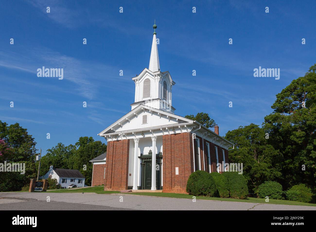 View of the historic town of Boydton in Virginia. Methodist church looking splendid in the hot summer sunshine. Stock Photo