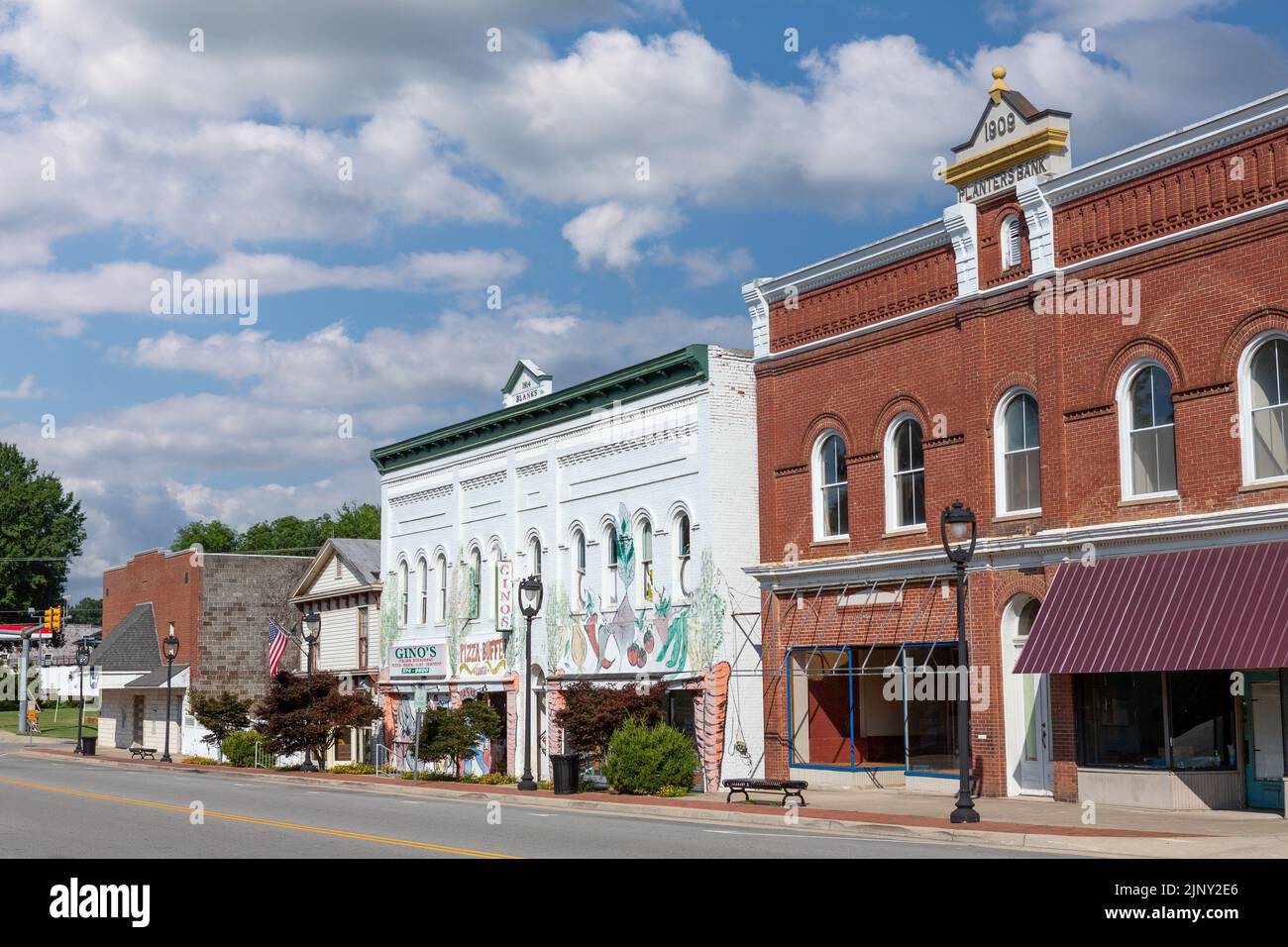 Small town of Clarksville in Virginia state. Mixed row of businesses along the main street. Stock Photo