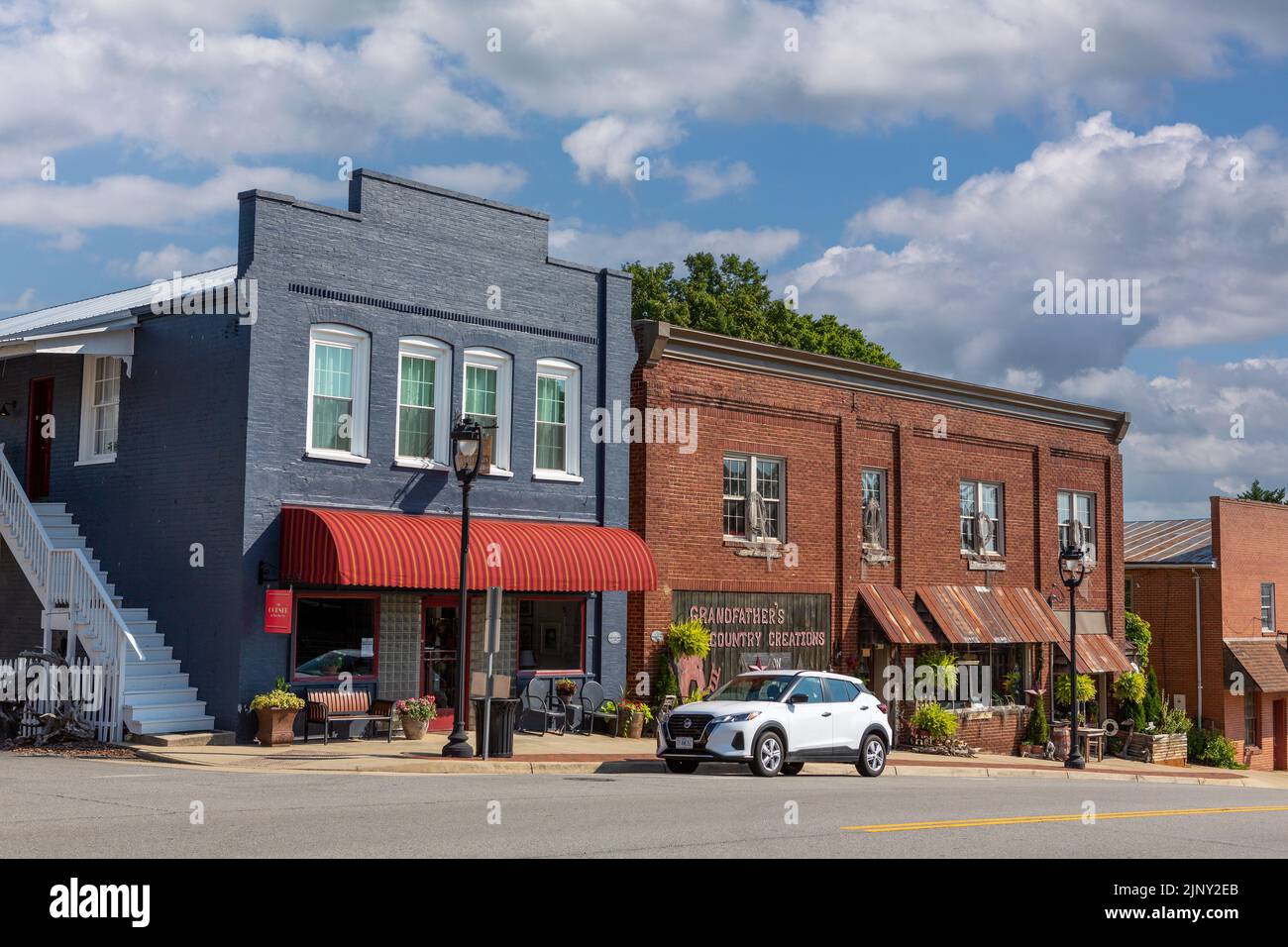 Small town of Clarksville in Virginia state. Mixed row of businesses