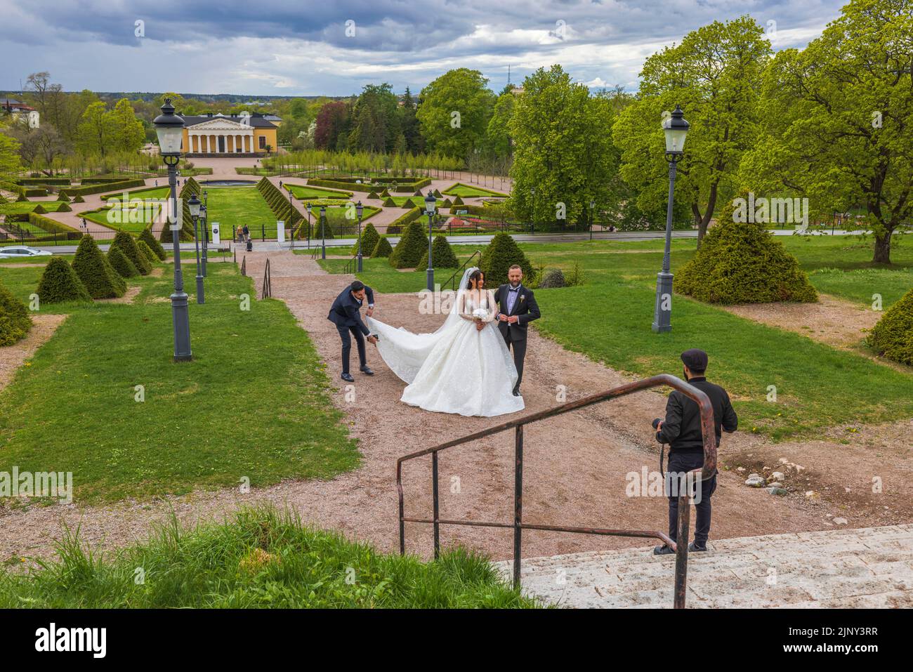Bride descending stairs hi-res stock photography and images - Alamy