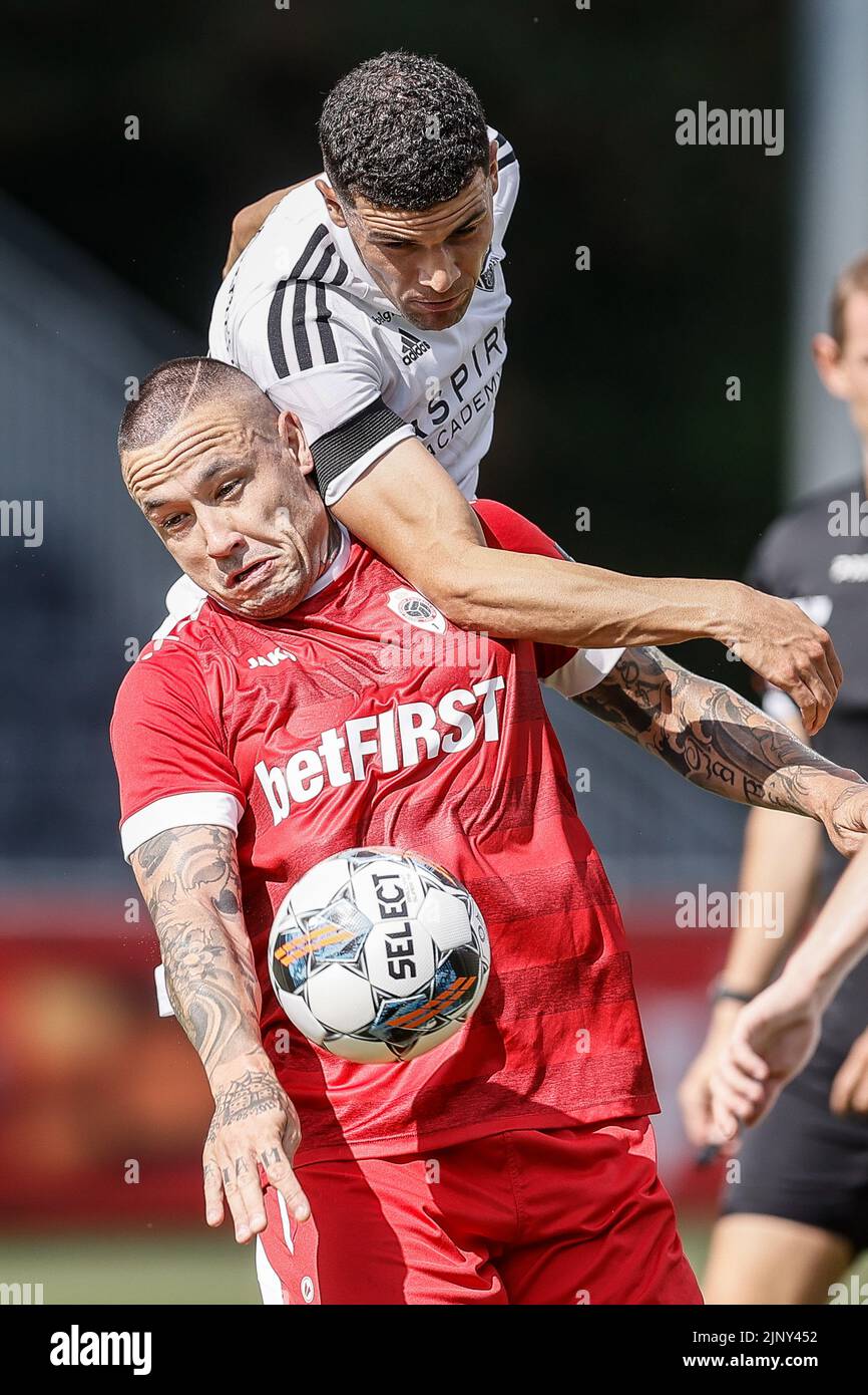 Antwerp's Radja Nainggolan and Eupen's Isaac Christie-Davies fight for the ball during a soccer match between KAS Eupen and Royal Antwerp FC RAFC, Sunday 14 August 2022 in Eupen, on day 4 of the 2022-2023 'Jupiler Pro League' first division of the Belgian championship. BELGA PHOTO BRUNO FAHY Stock Photo