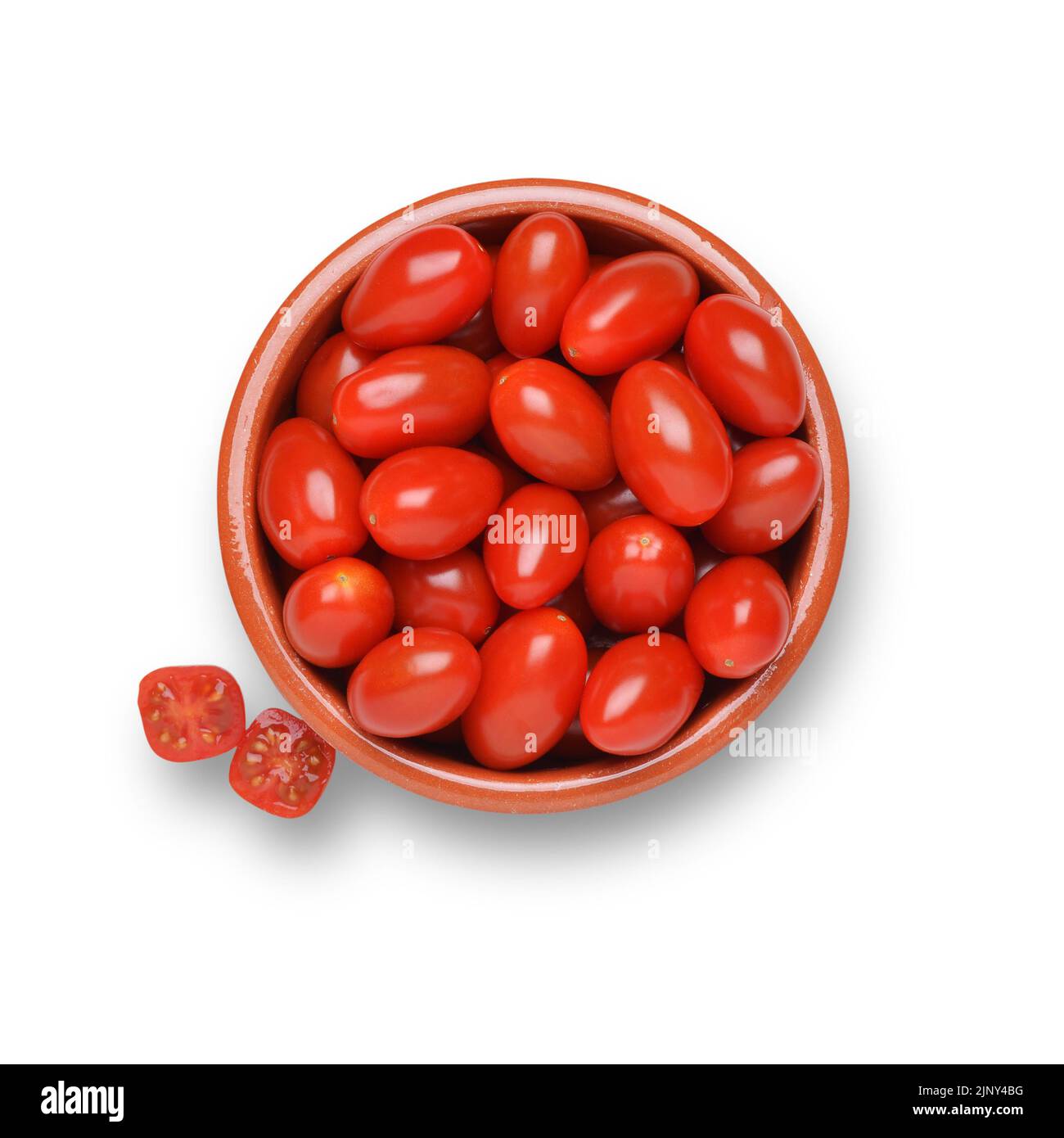 Plum tomatoes in bowl cut out on white background Stock Photo