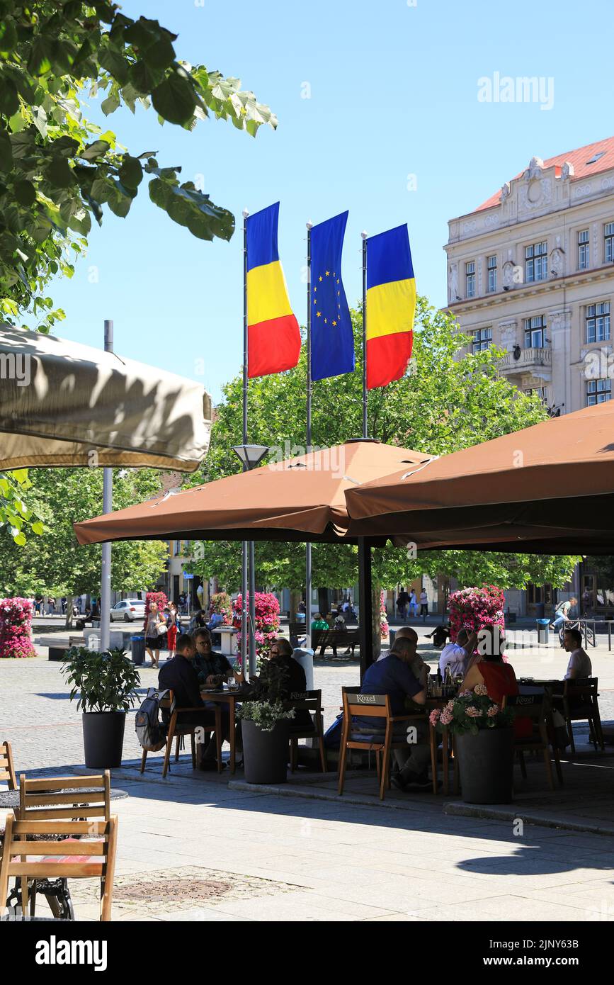 Pretty cafes on Piata Unirii, the Union Square in ClujNapoca, the