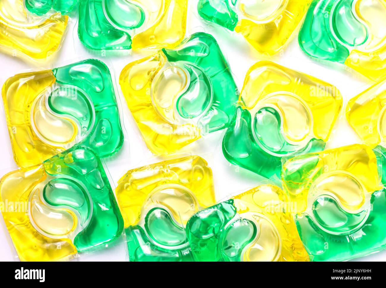 Group of gel laundry detergent or washing capsule pods isolated on