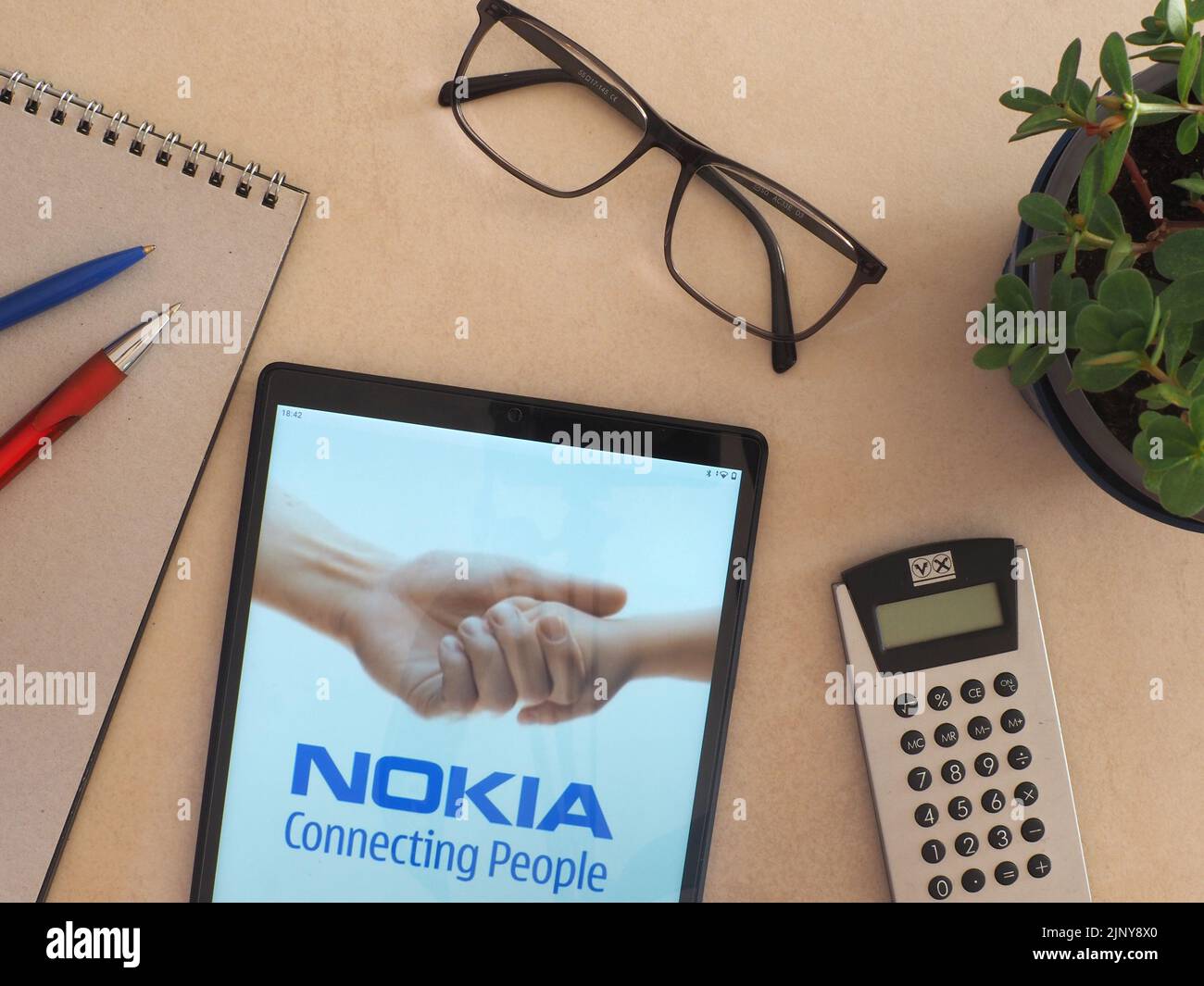 In this photo illustration, Nokia Corporation logo seen displayed on a tablet Stock Photo