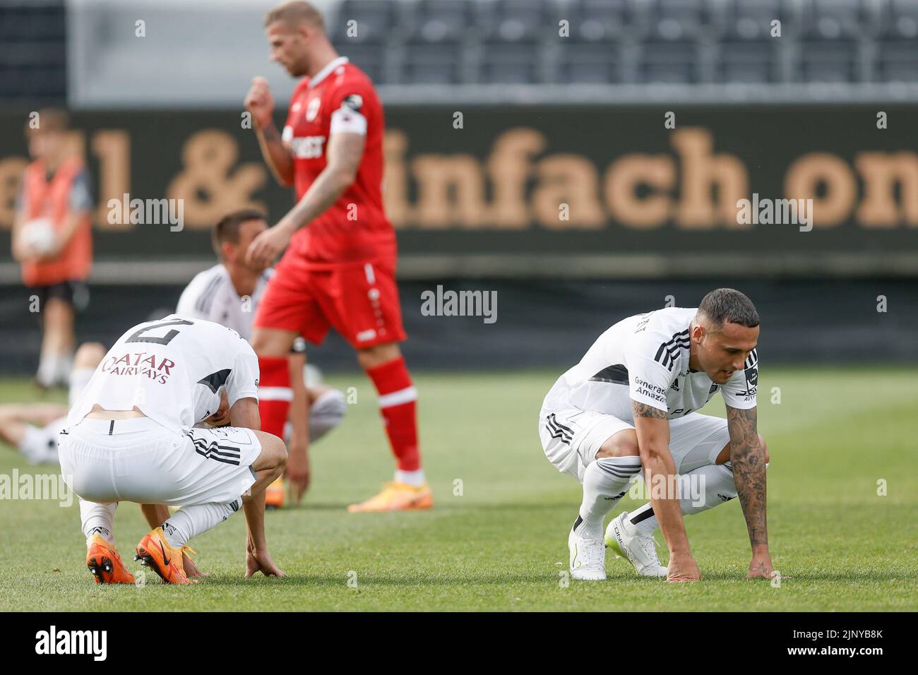 Eupen's players look dejected after a soccer match between KAS Eupen and Royal Antwerp FC RAFC, Sunday 14 August 2022 in Eupen, on day 4 of the 2022-2023 'Jupiler Pro League' first division of the Belgian championship. BELGA PHOTO BRUNO FAHY Stock Photo