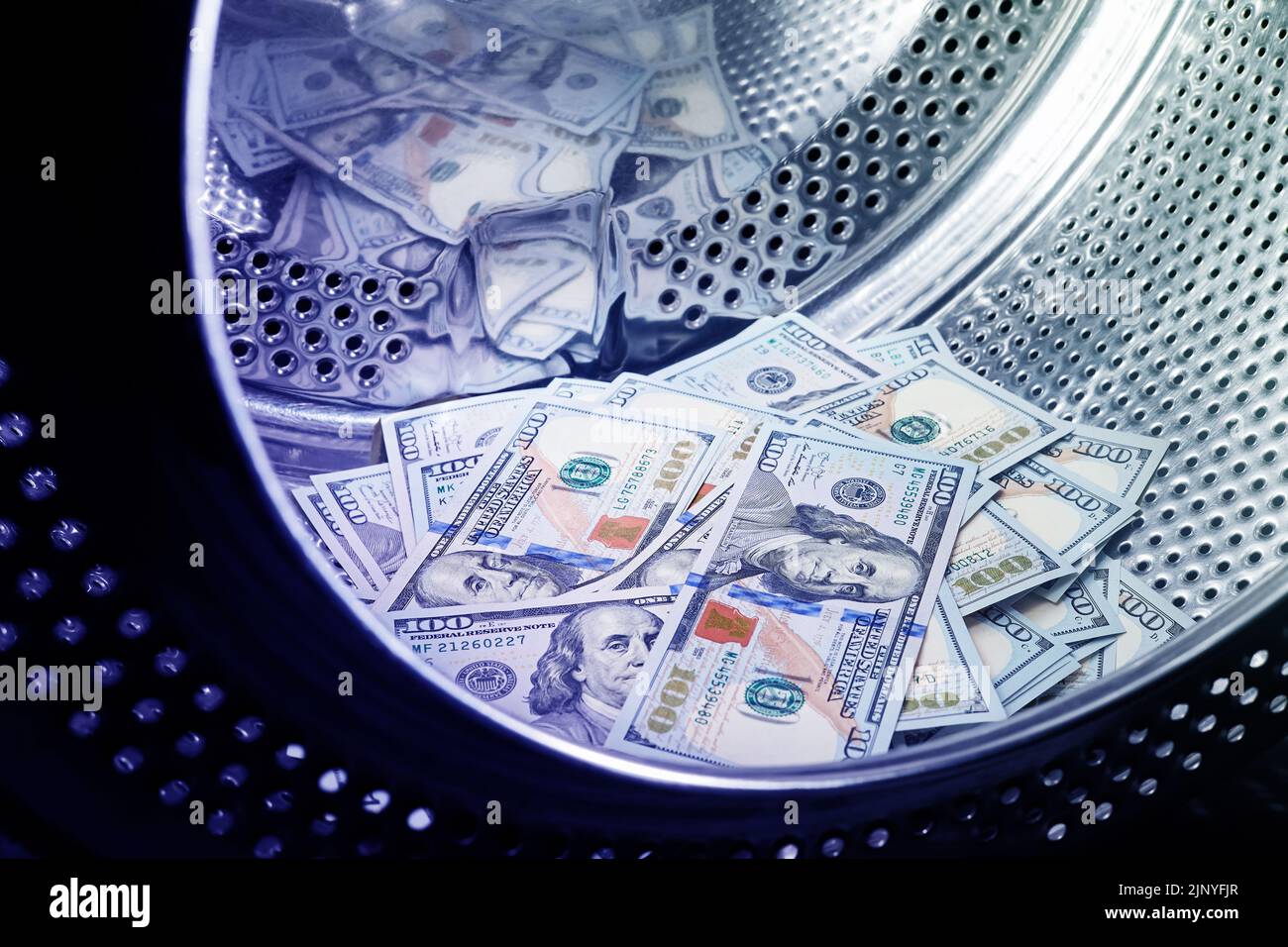 Money laundering in washing machine hi-res stock photography and images ...