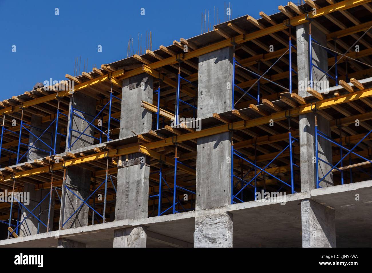 Construction of a residential building. Part of urban real estate and architecture. Facade of a residential building. Stock Photo